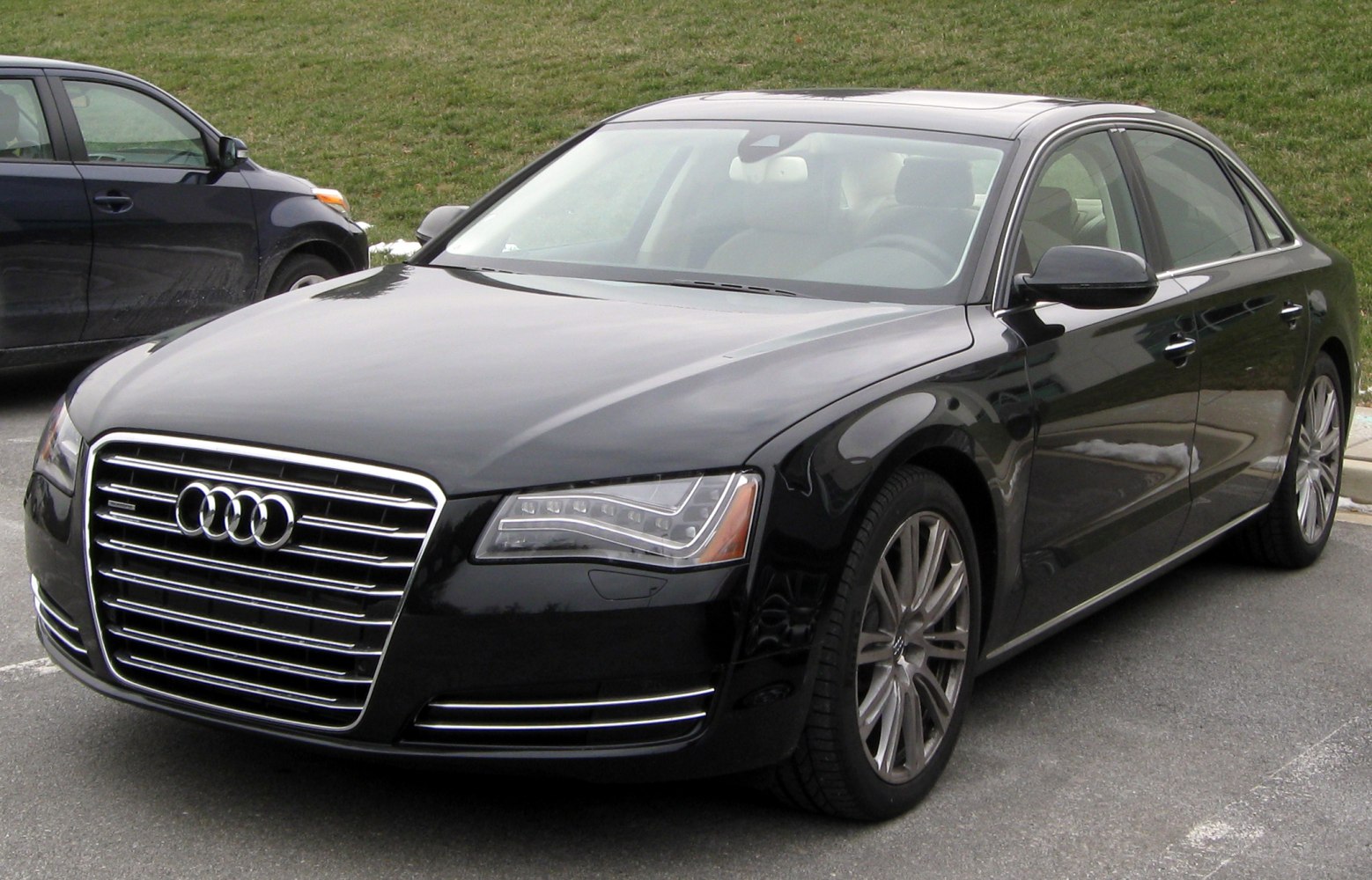 Front grille and LED headlights of a luxury sedan