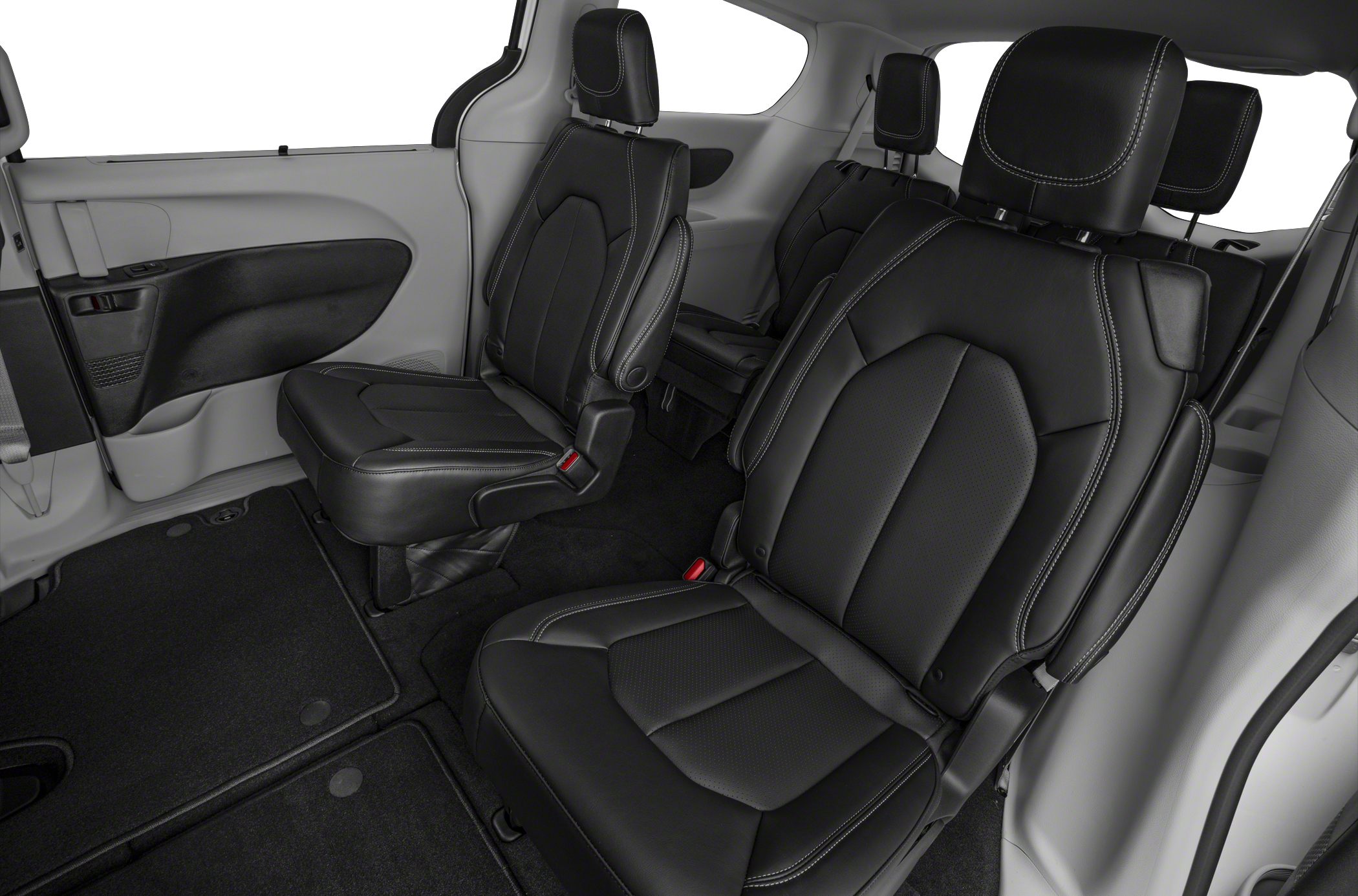 Black leather captain seats with white stitching in vehicle interior
