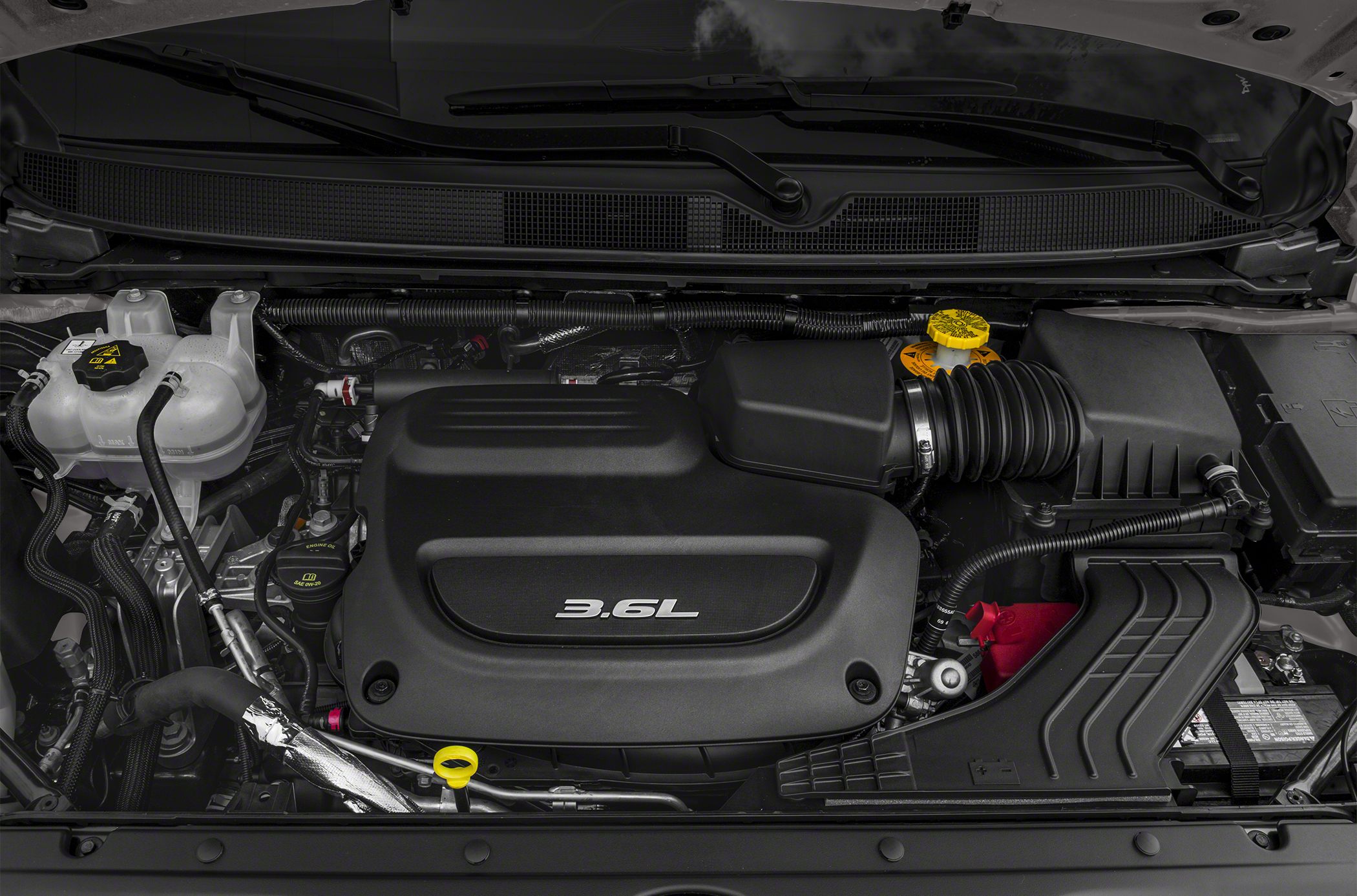 3.6L engine cover with surrounding engine bay components