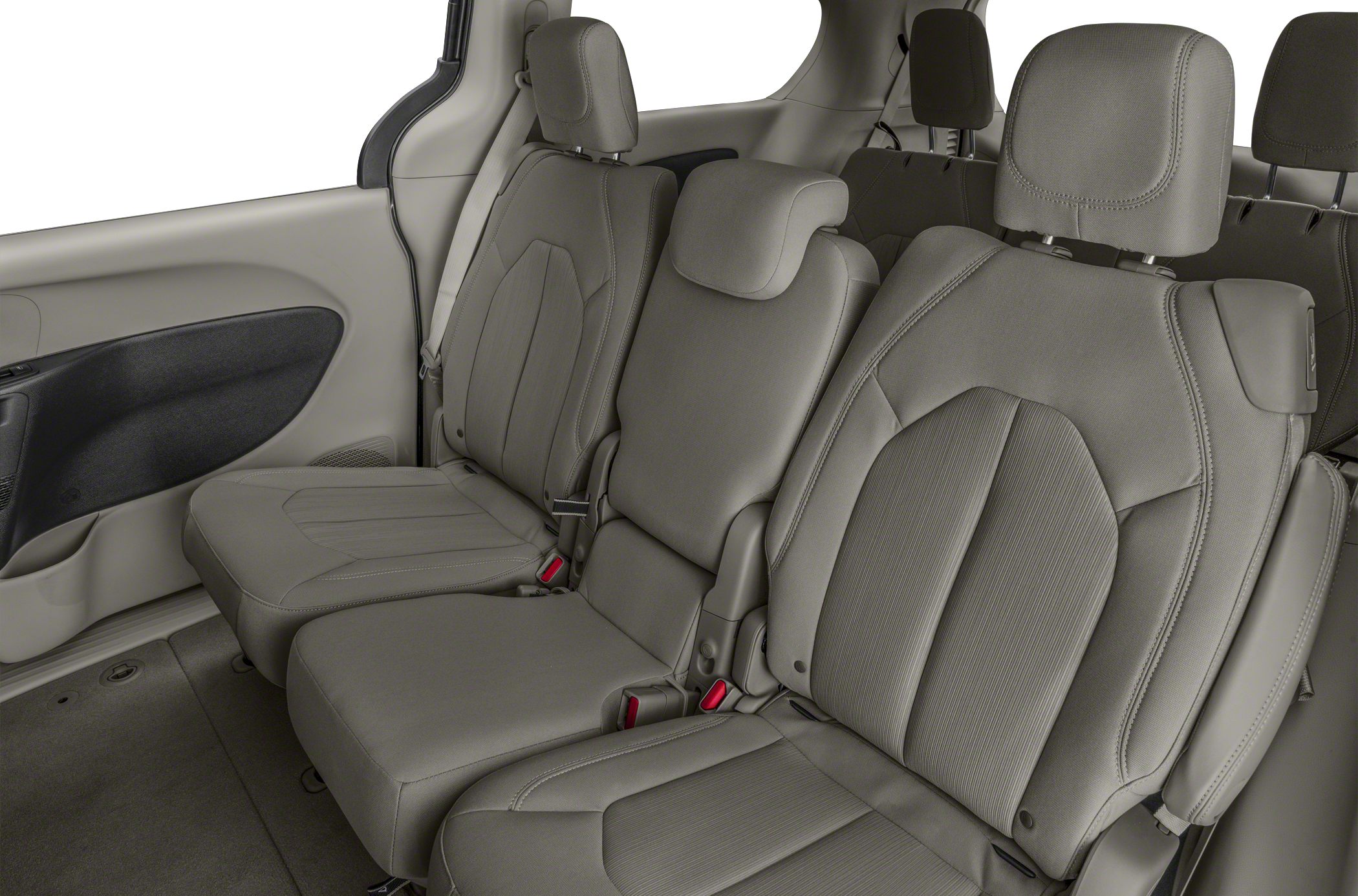 Rear seats with upholstery and headrests in a minivan interior