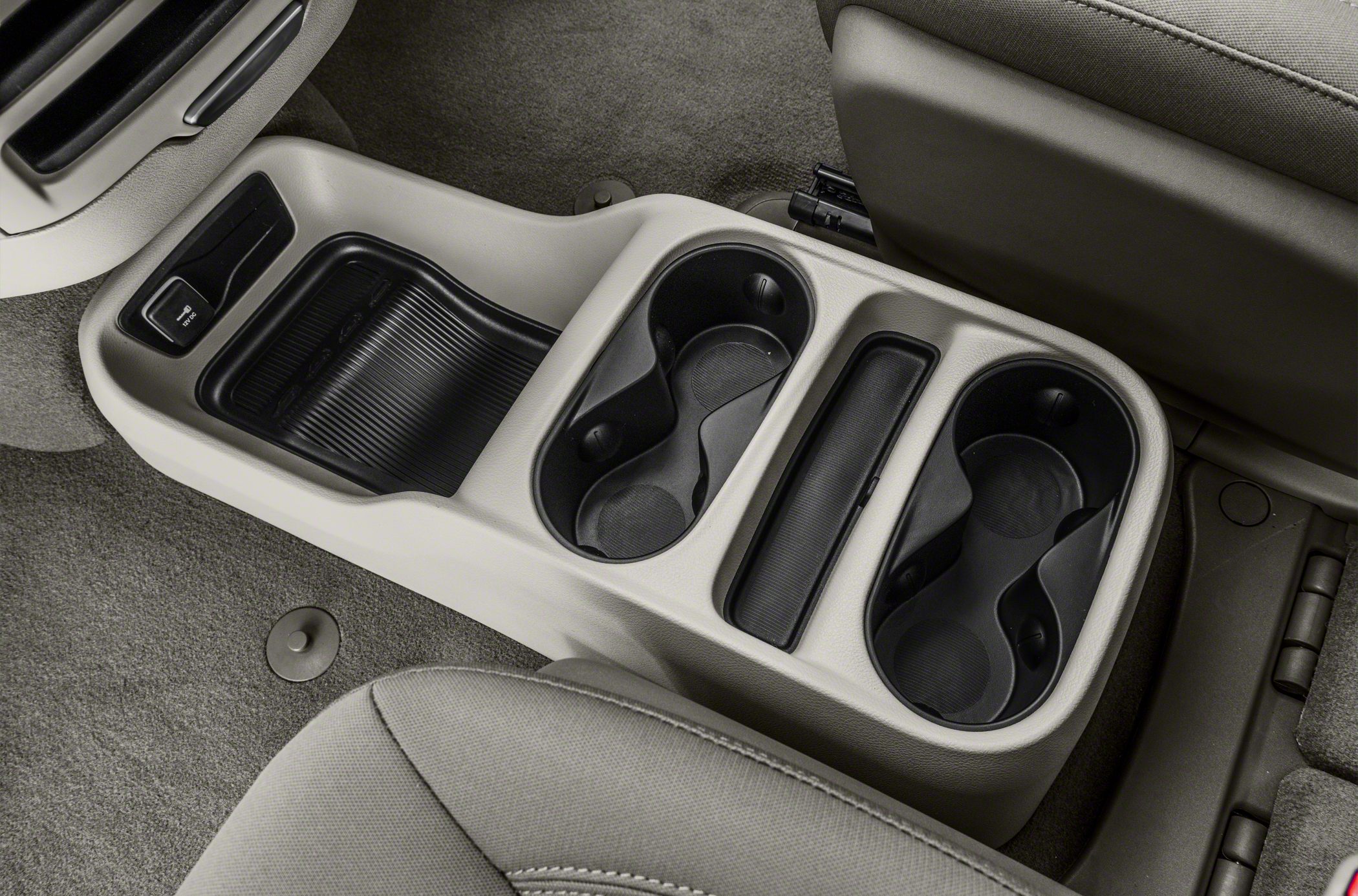 Center console with dual cup holders and storage compartment