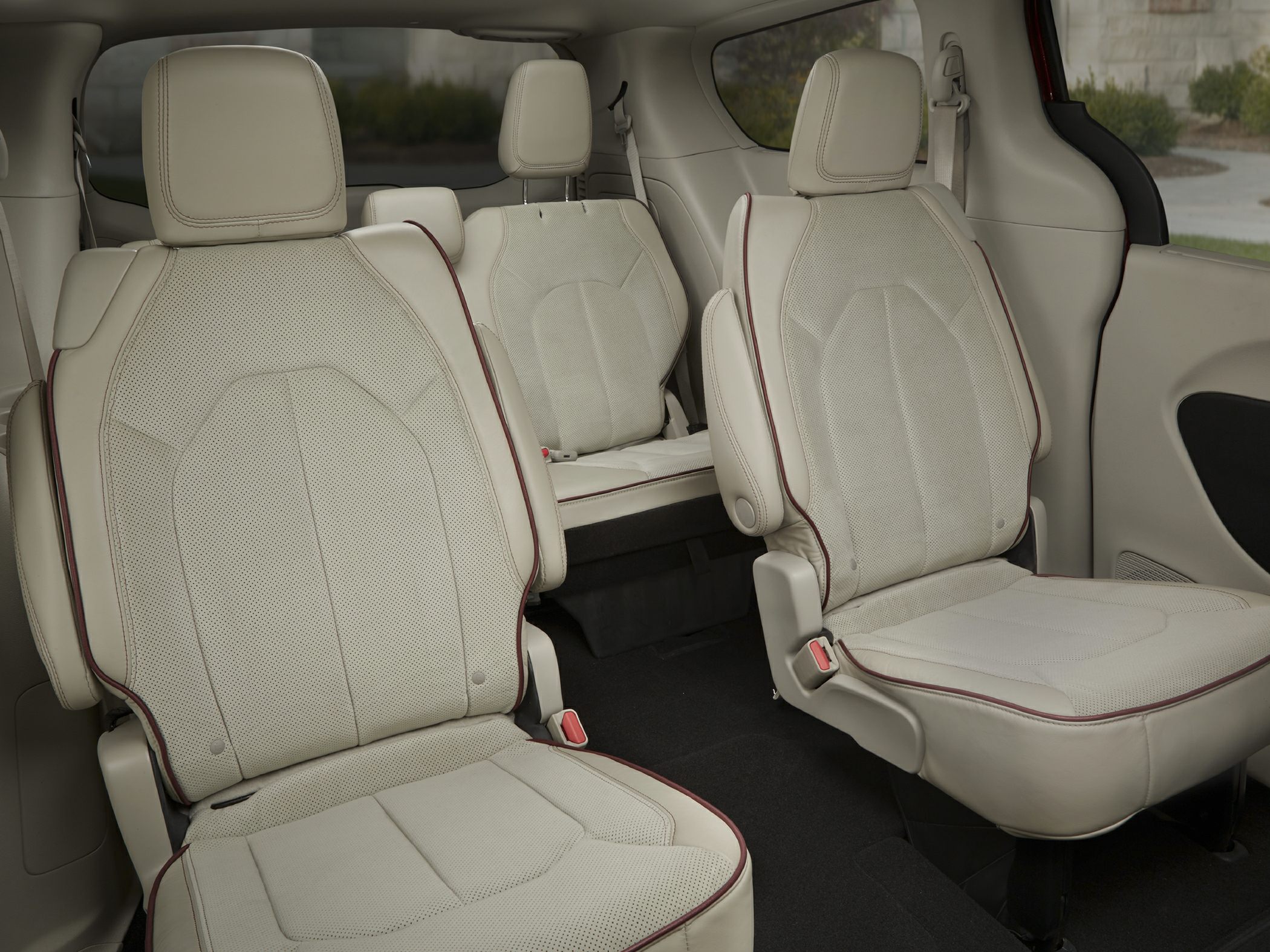 luxurious second-row captain chairs and third-row bench seat in minivan