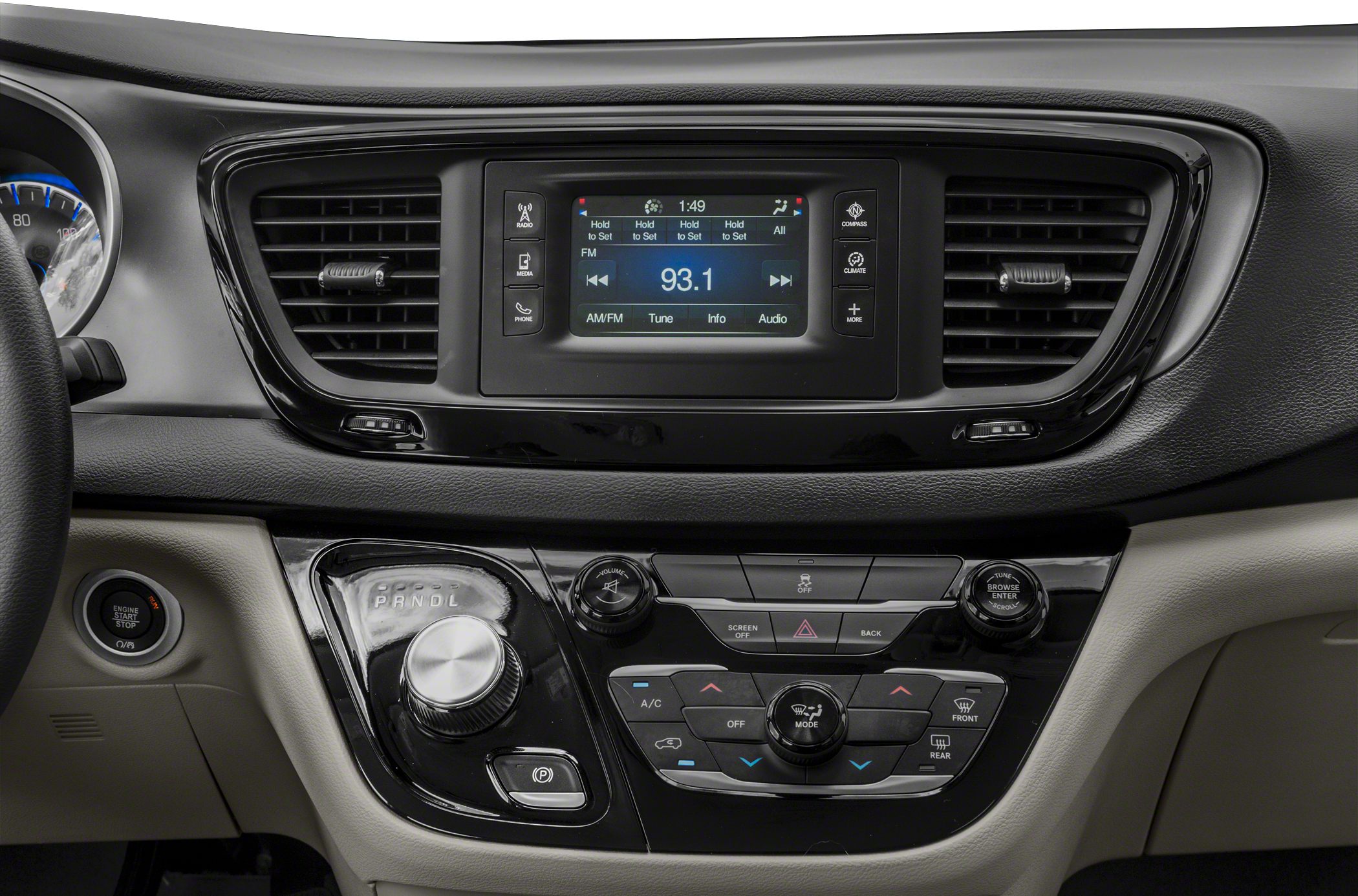 Center console with rotary gear selector, touchscreen, and climate control buttons.