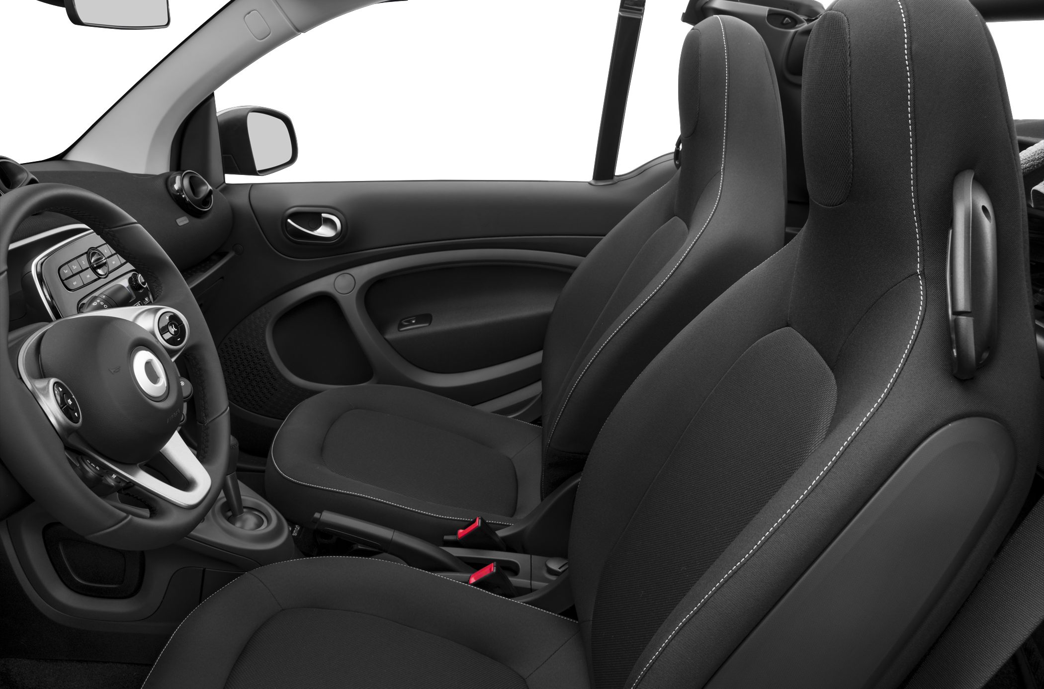 Front seats and dashboard of a compact cabriolet interior