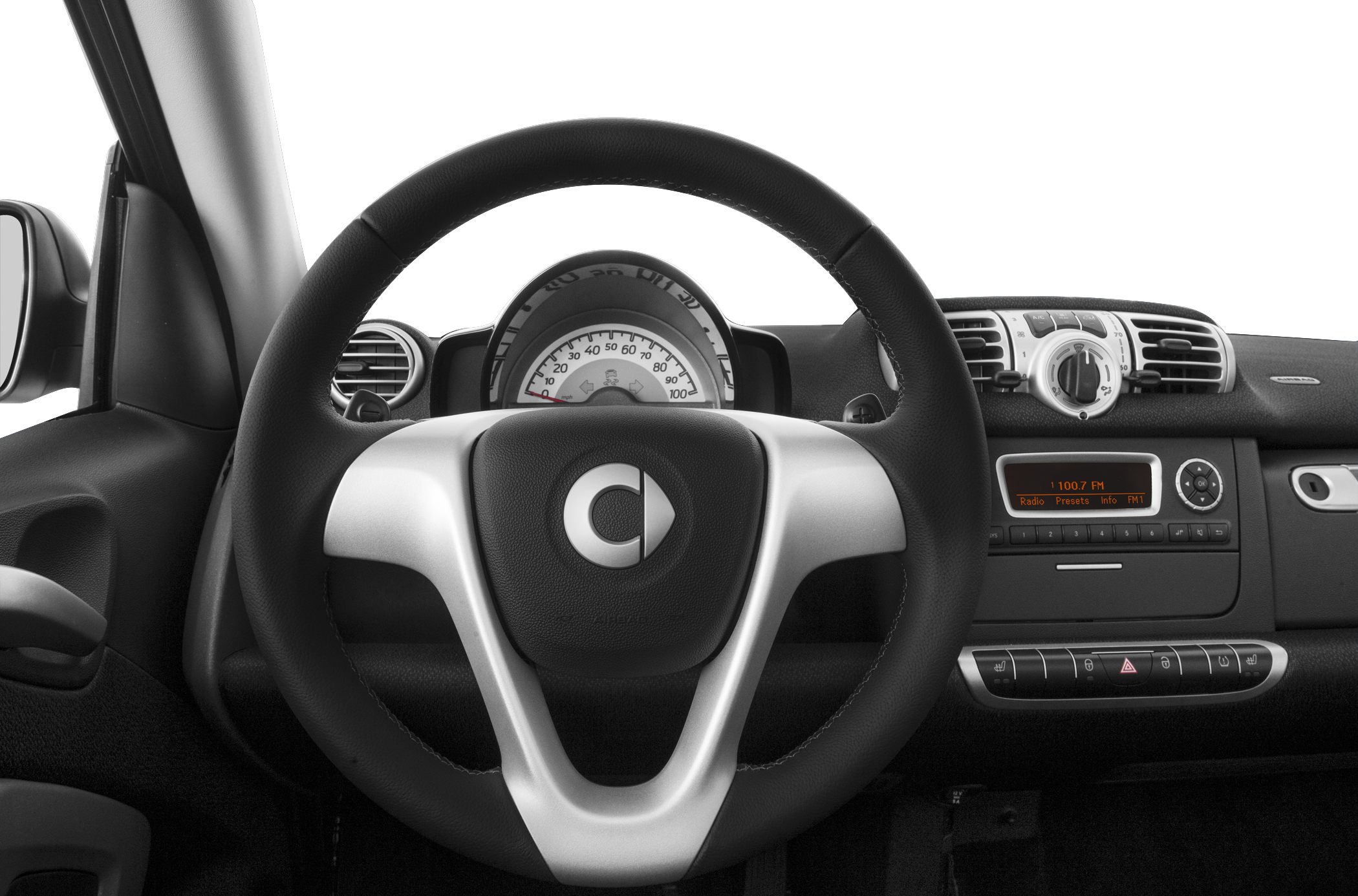 Steering wheel and dashboard with radio display and central speedometer