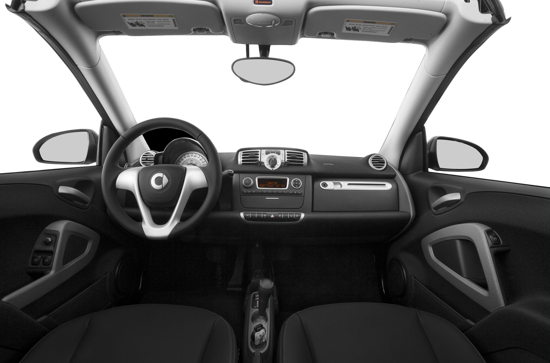 Car interior dashboard and steering wheel with compact cockpit layout