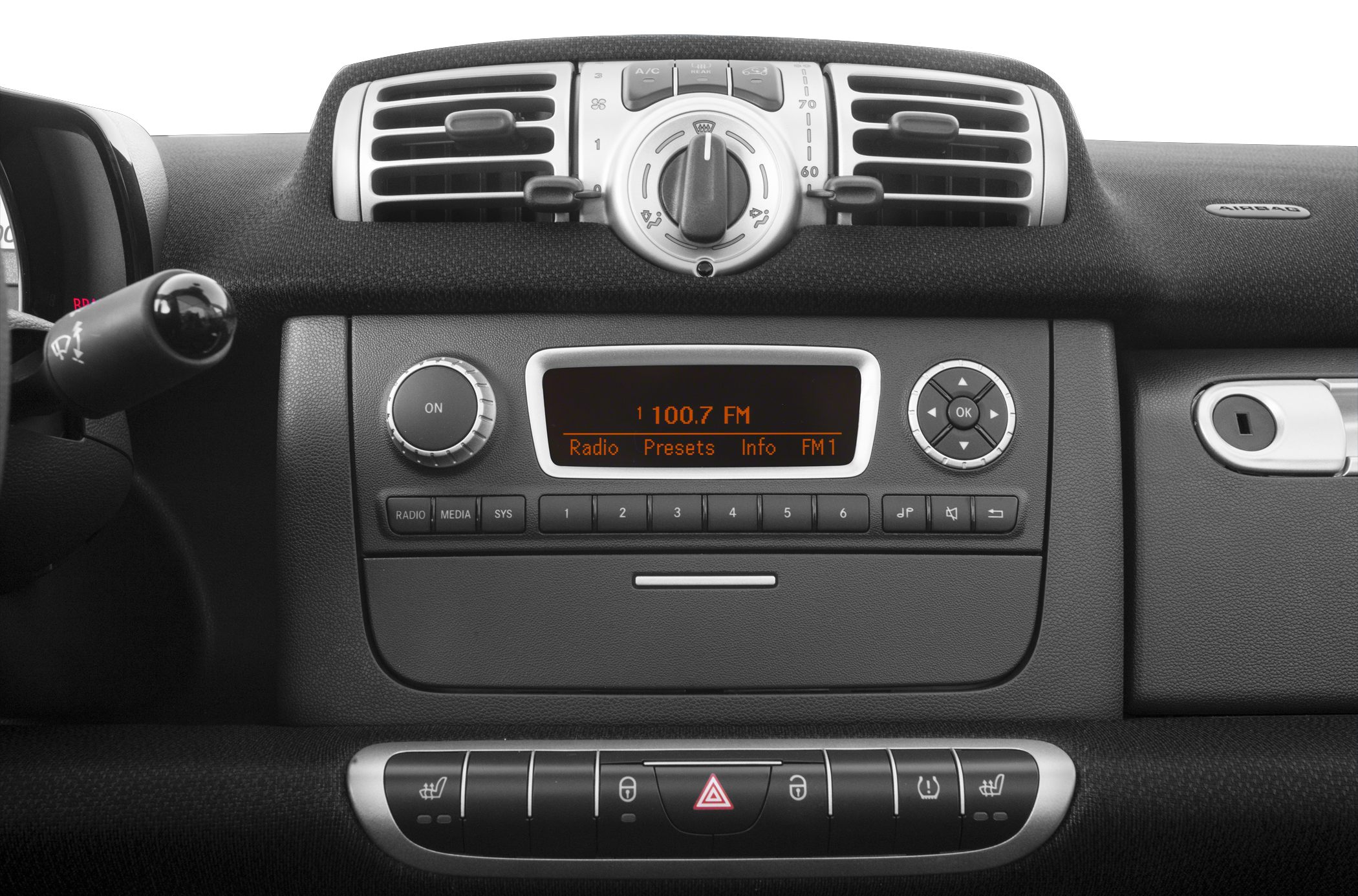 Dashboard ventilation vents and radio system control panel