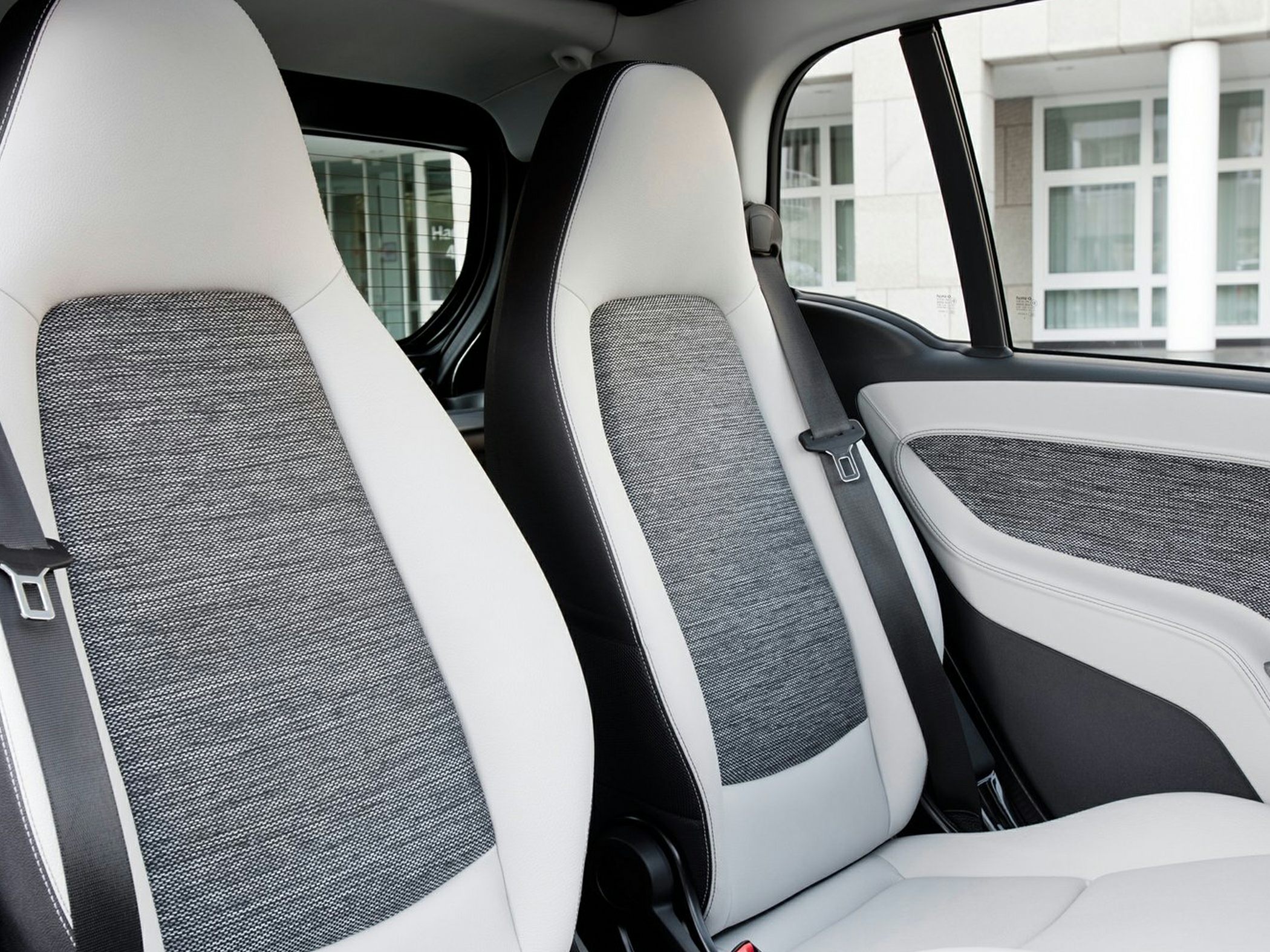 Two-tone fabric and leather front seats with matching door panel