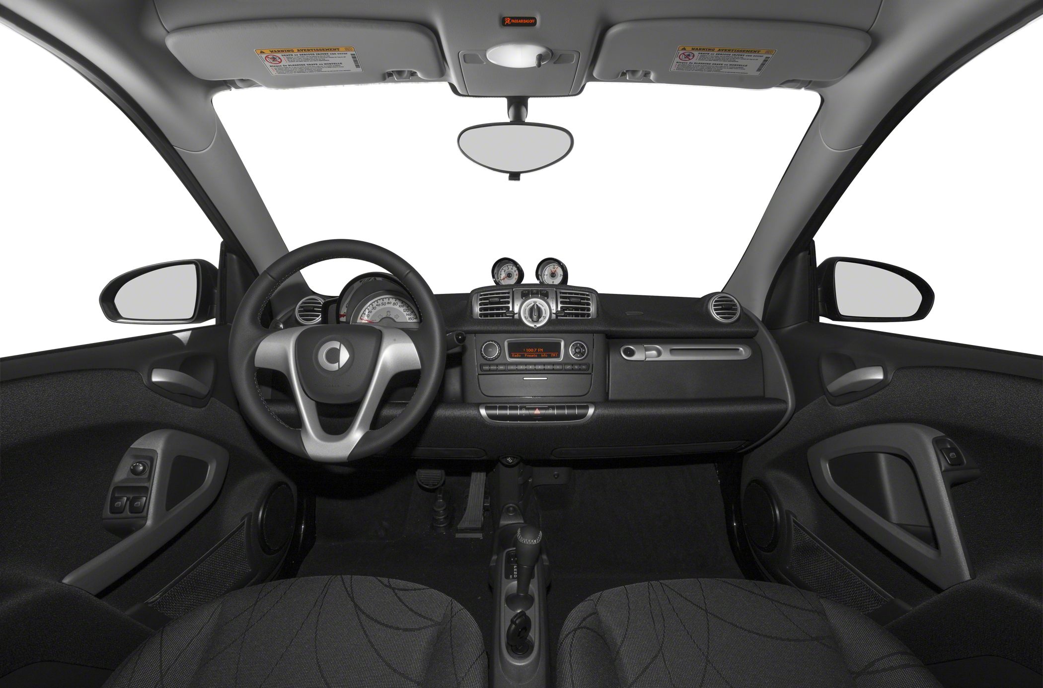 Dashboard, steering wheel, and instrument panel of a compact vehicle interior