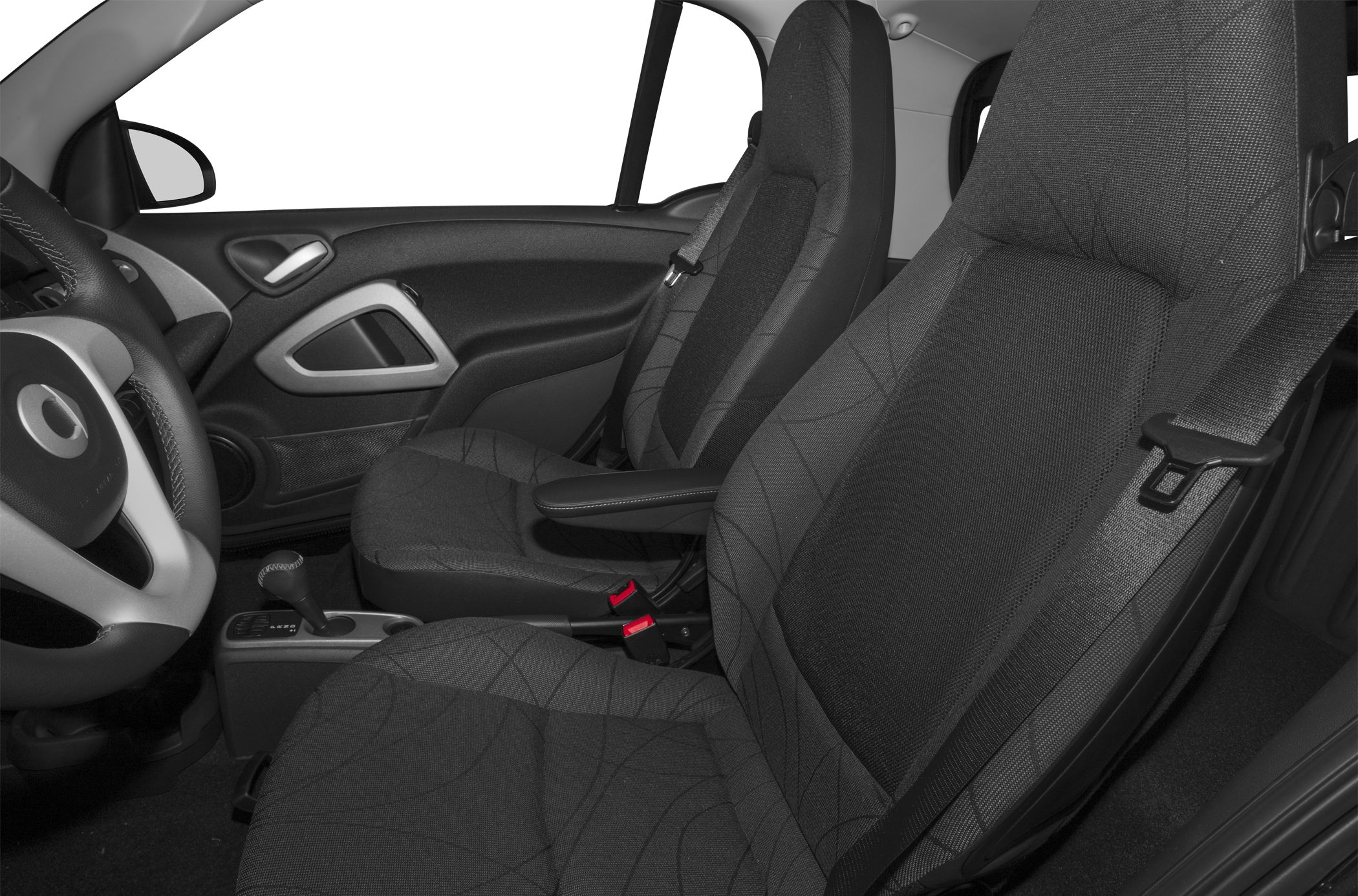 Front seats and center armrest with seatbelt inside compact car interior