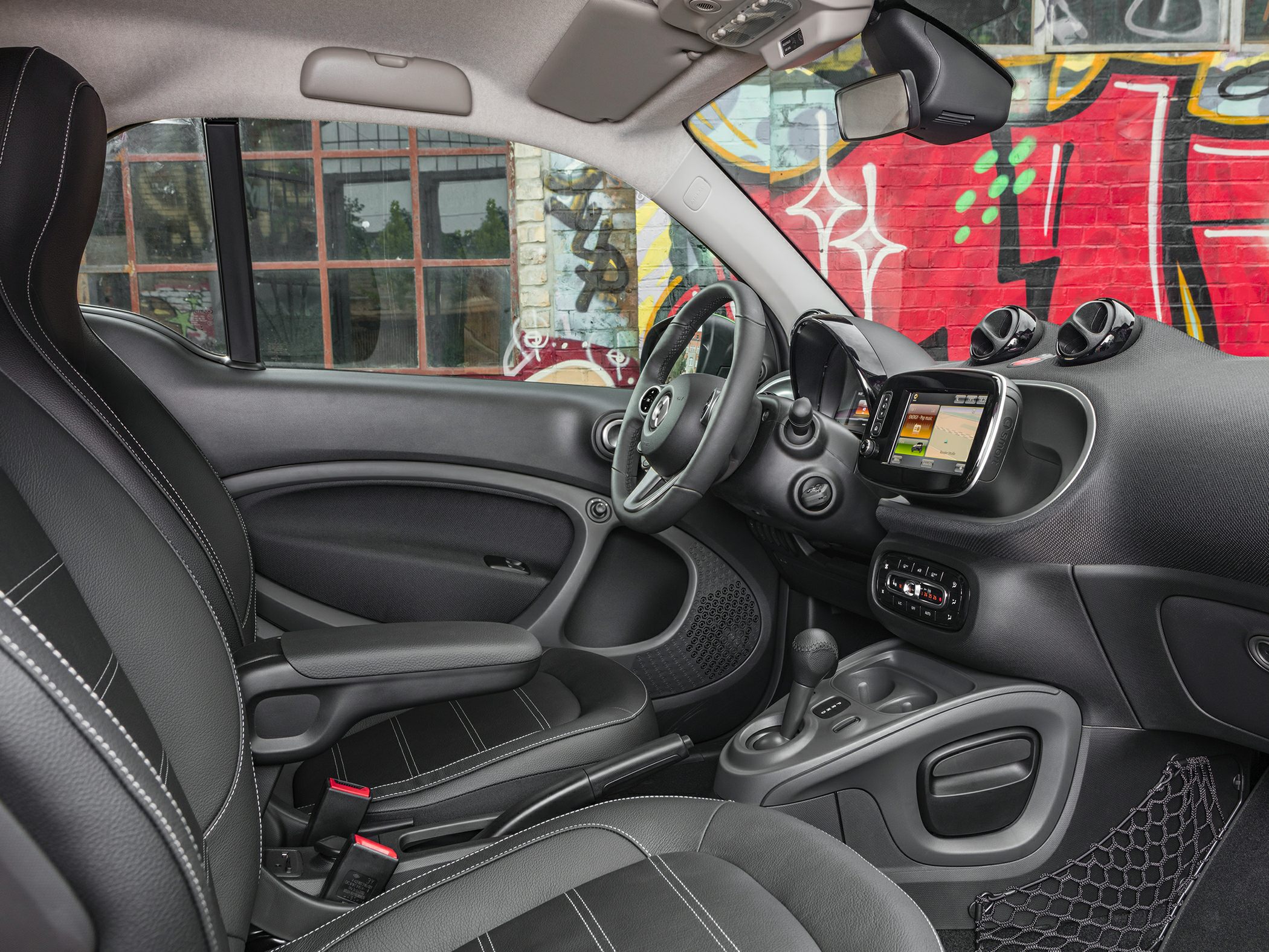 Interior with touchscreen, ergonomic seats, modern dashboard