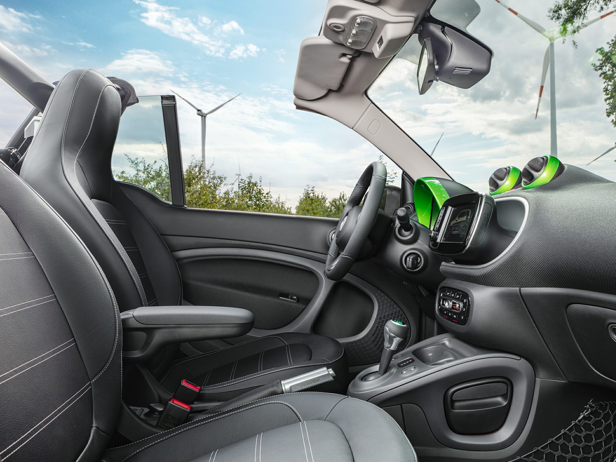 Convertible electric car interior with dashboard and steering wheel