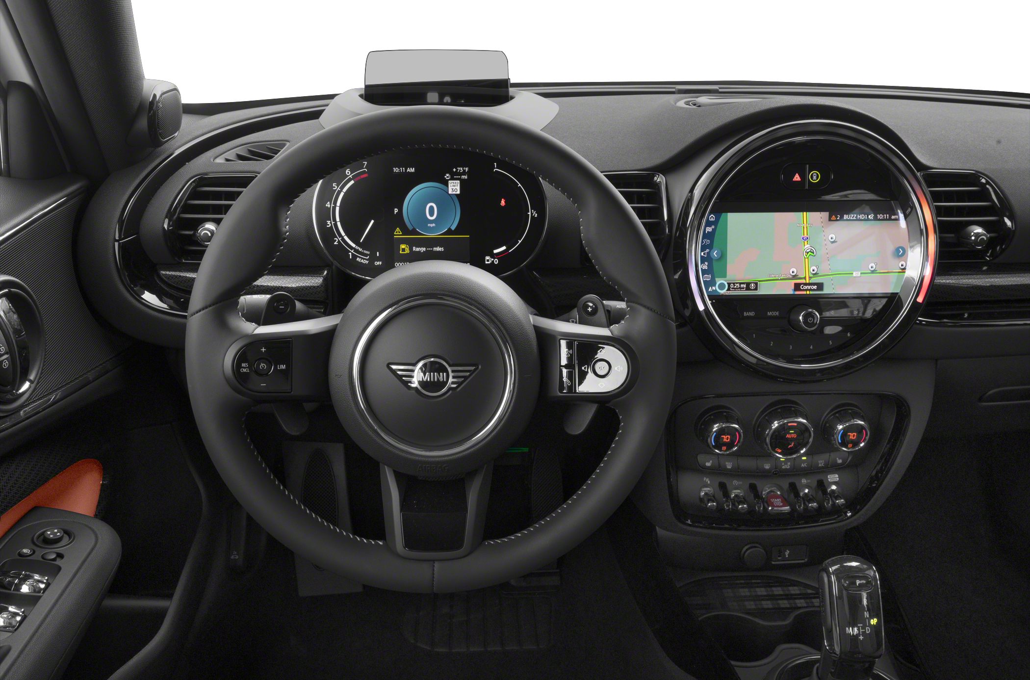 Digital instrument cluster and circular infotainment touchscreen in modern car interior