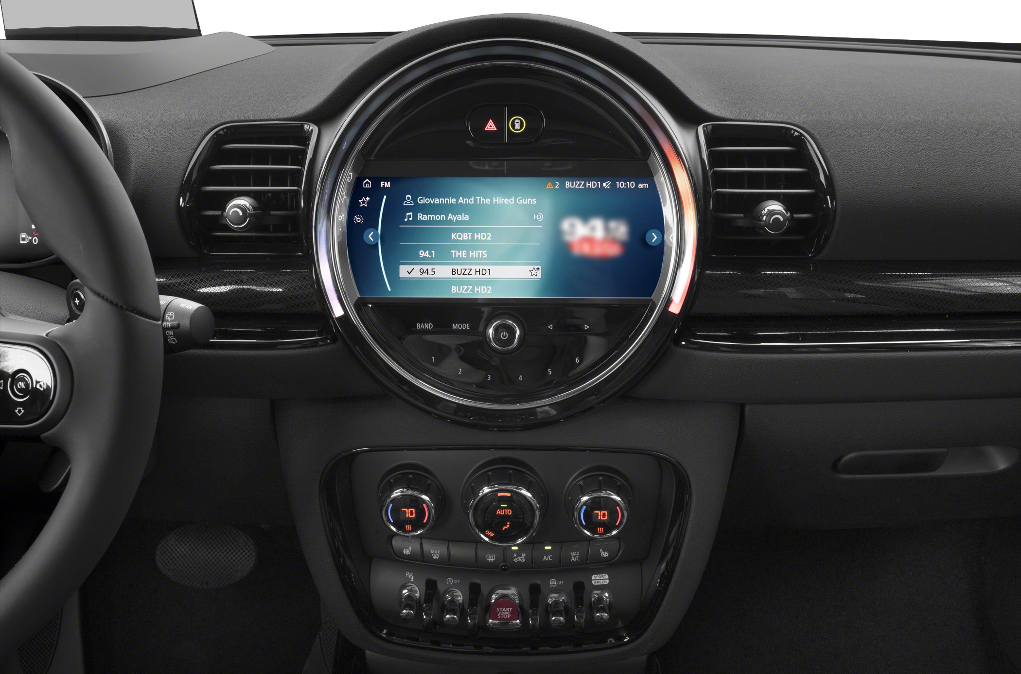 Circular infotainment display and climate control dashboard with toggle switches