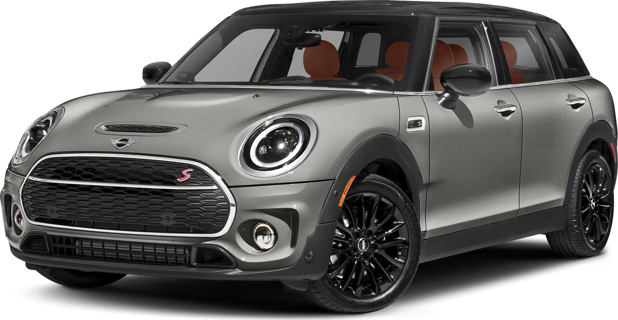Front side view with round LED headlights and black multi-spoke wheels
