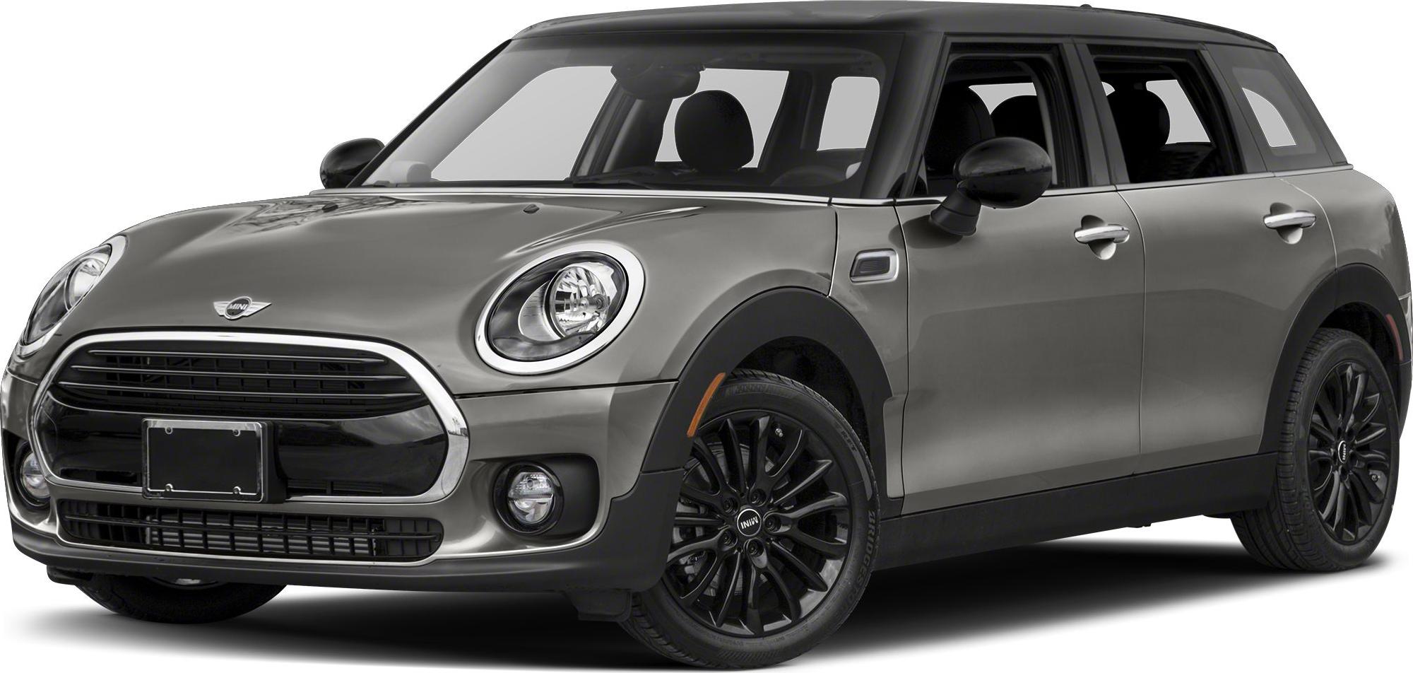 Front 3-quarter view showing round headlights and black alloy wheels