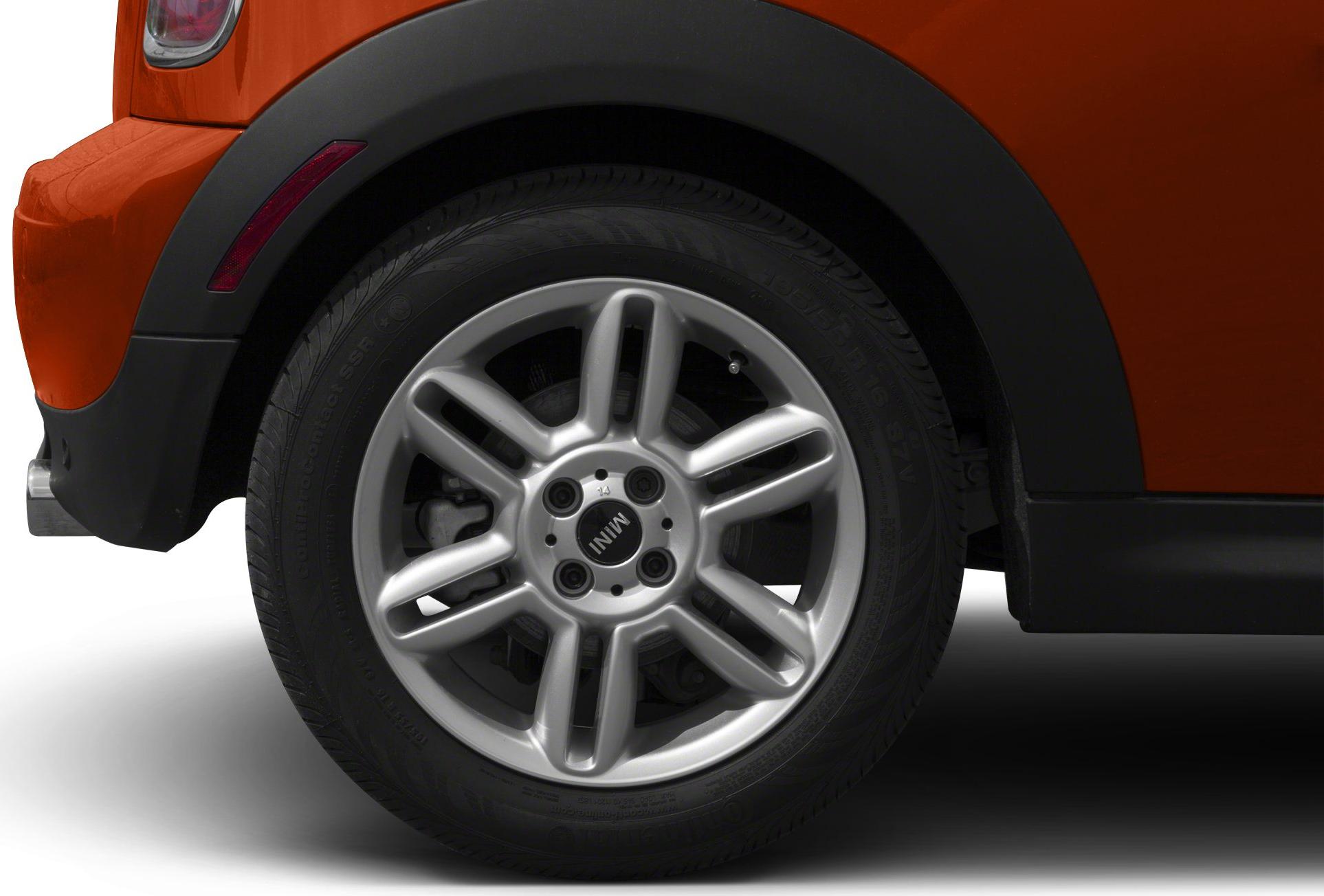 Close-up of a silver alloy wheel and tire