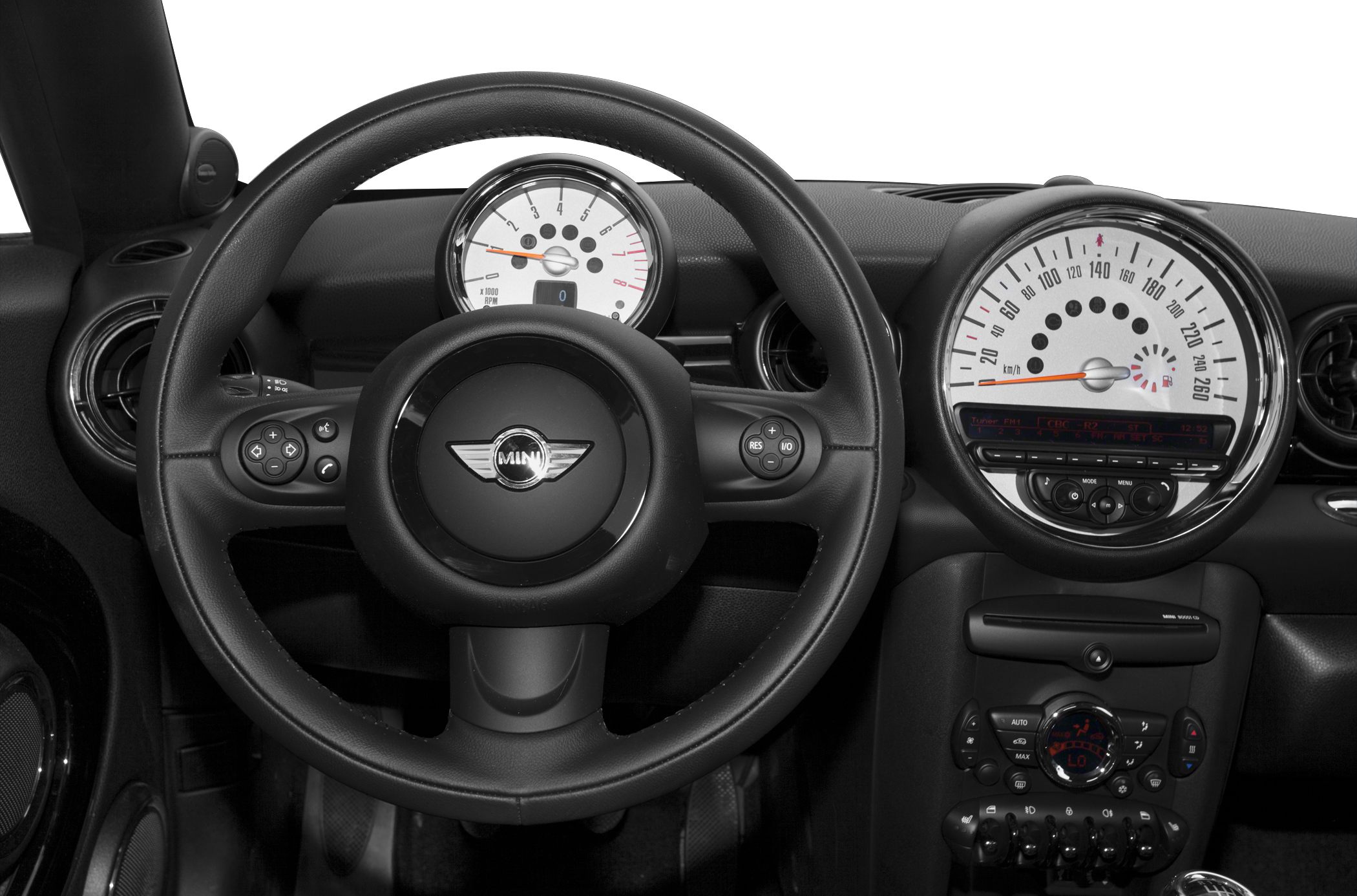 Dashboard and steering wheel with instrument clusters and control buttons