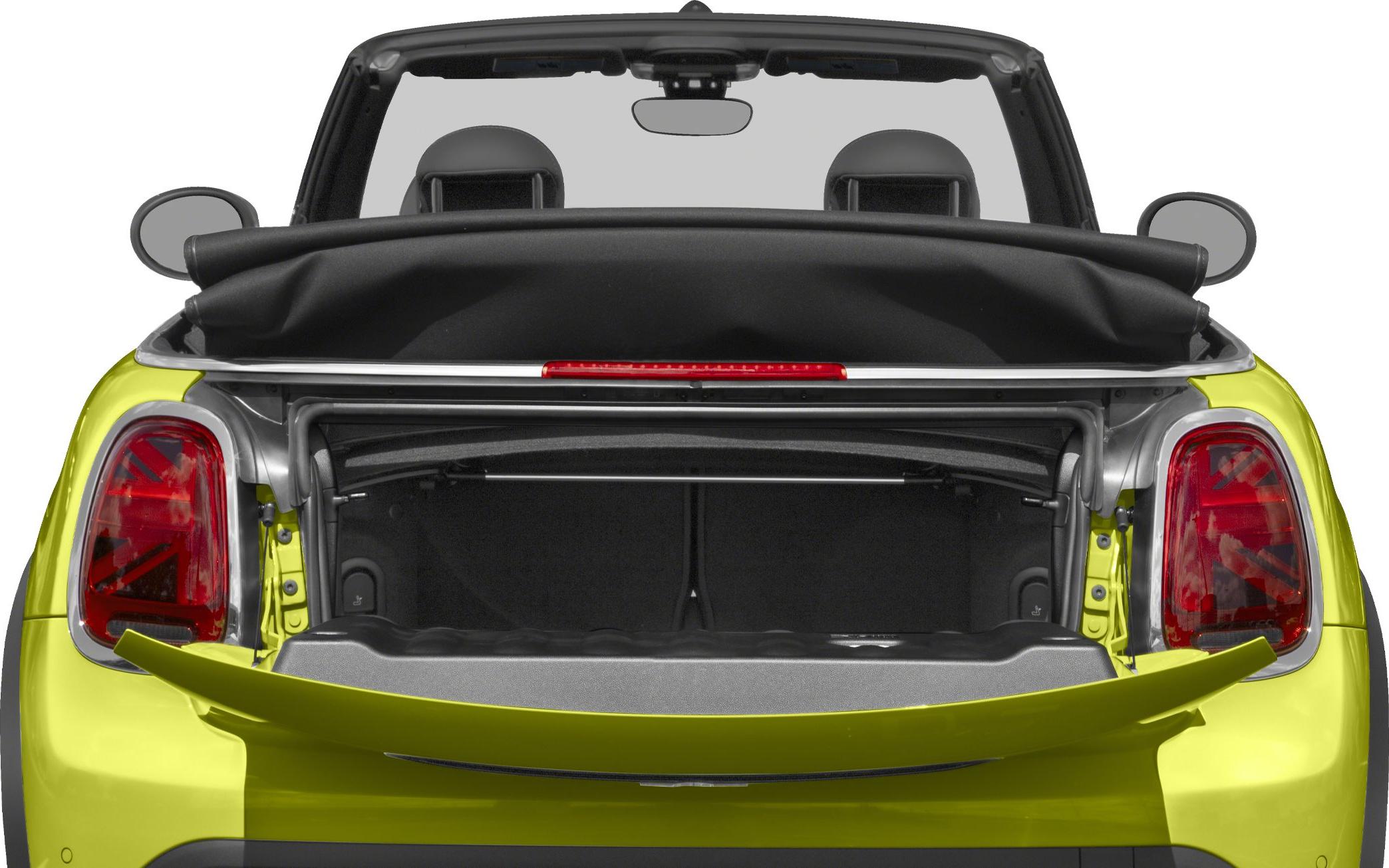 Convertible trunk open with soft top partially folded