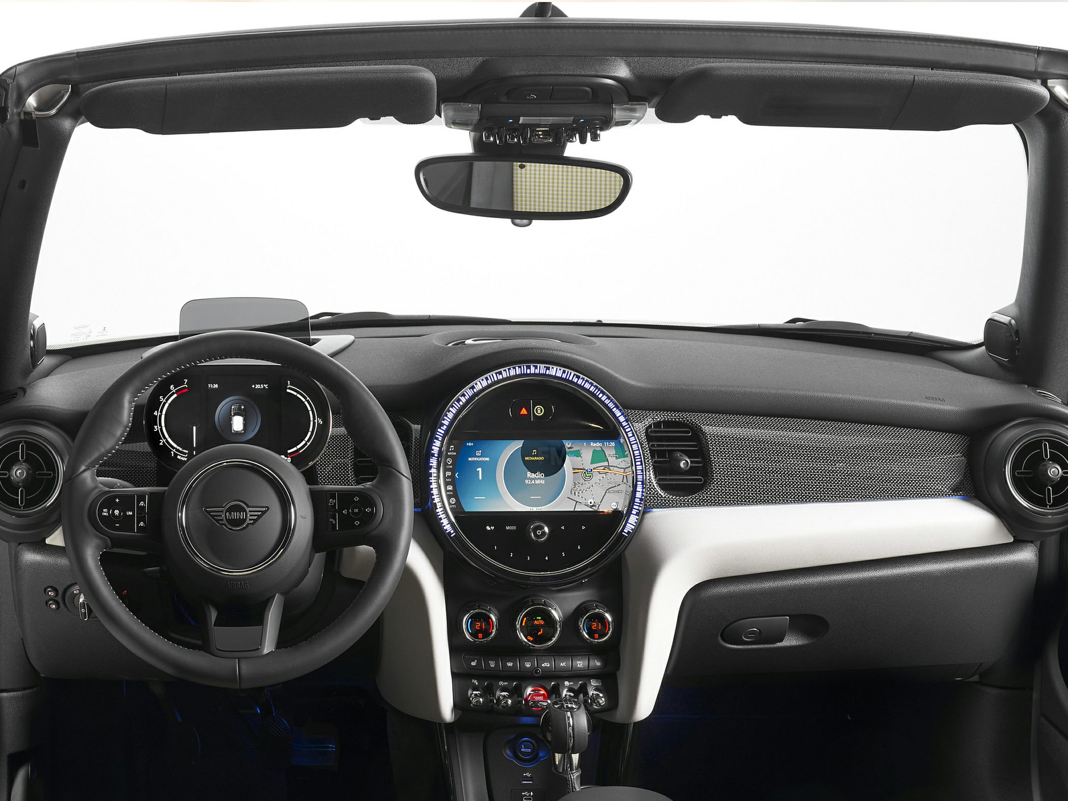 Convertible dashboard with steering wheel and infotainment display