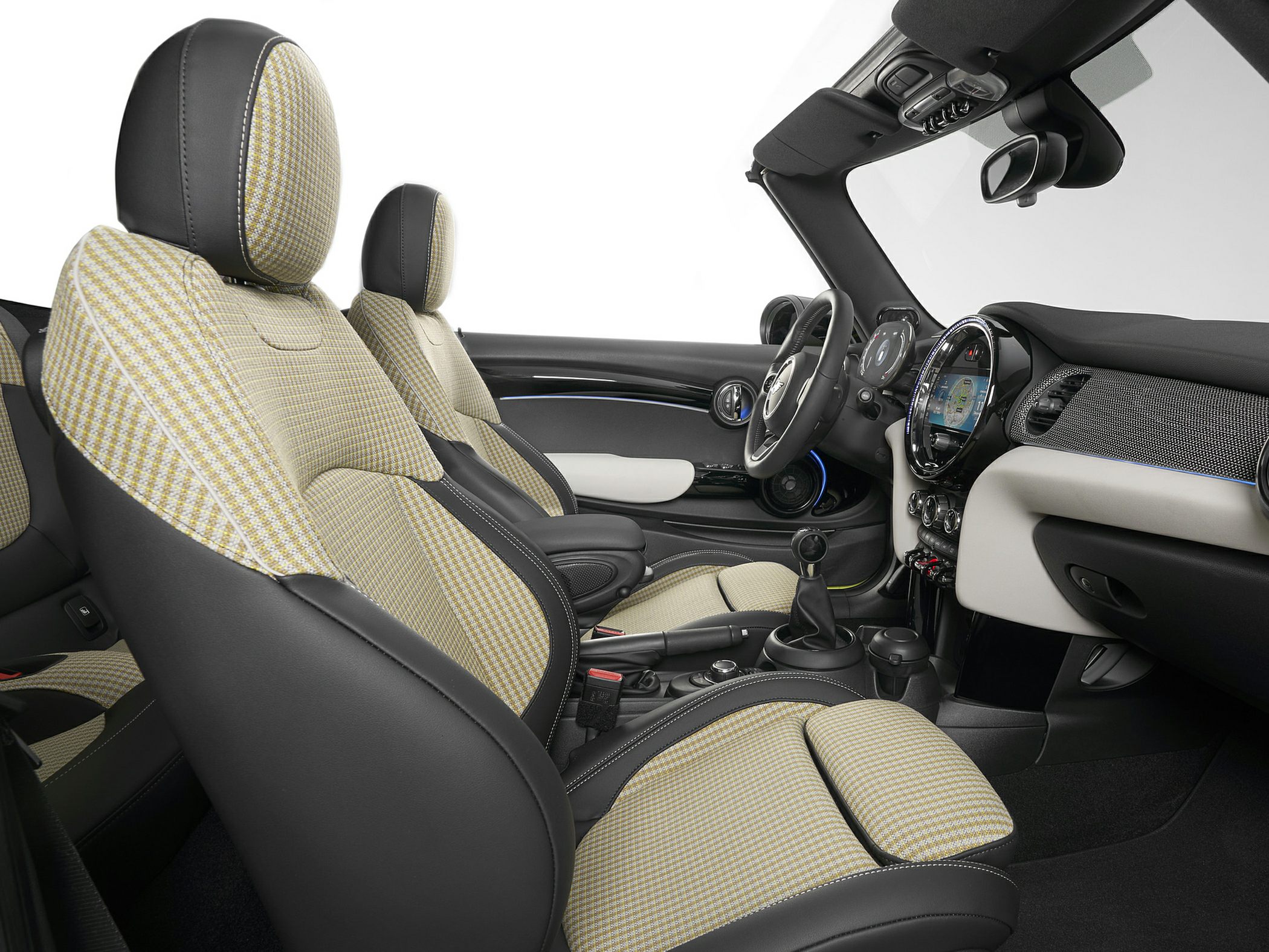Convertible interior with checkered seats and modern dashboard
