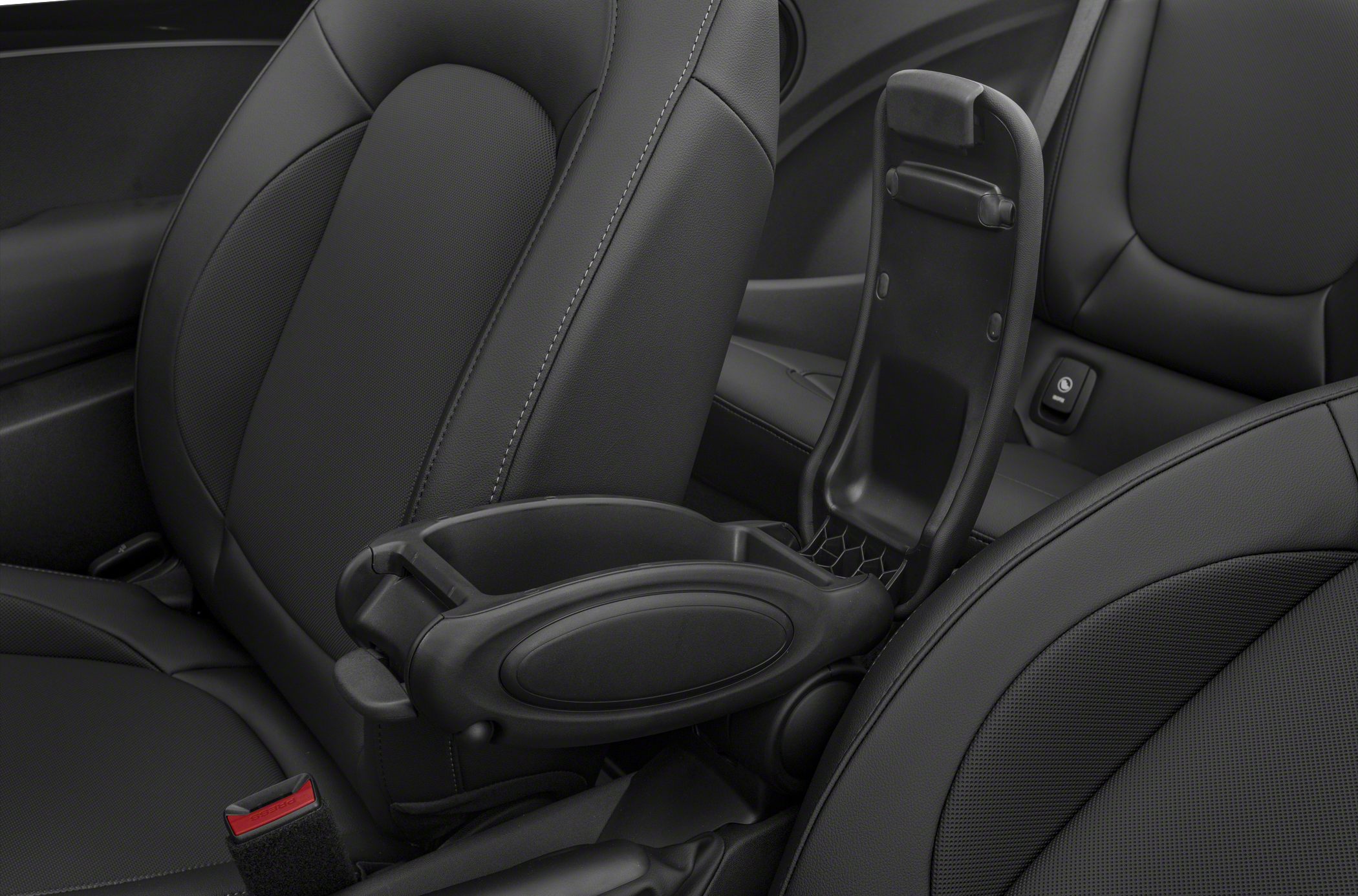 Car interior with detailed center console storage and ergonomic seats