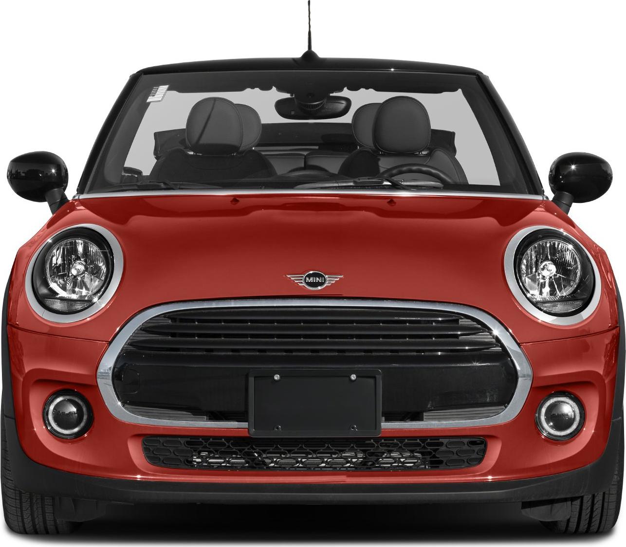 Front view showing round headlights and large grille