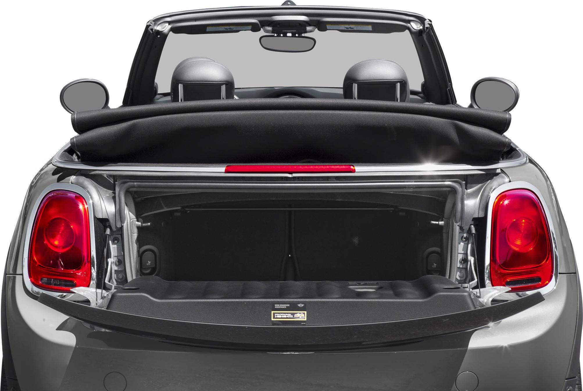 Open trunk and folded soft top with rear taillights.