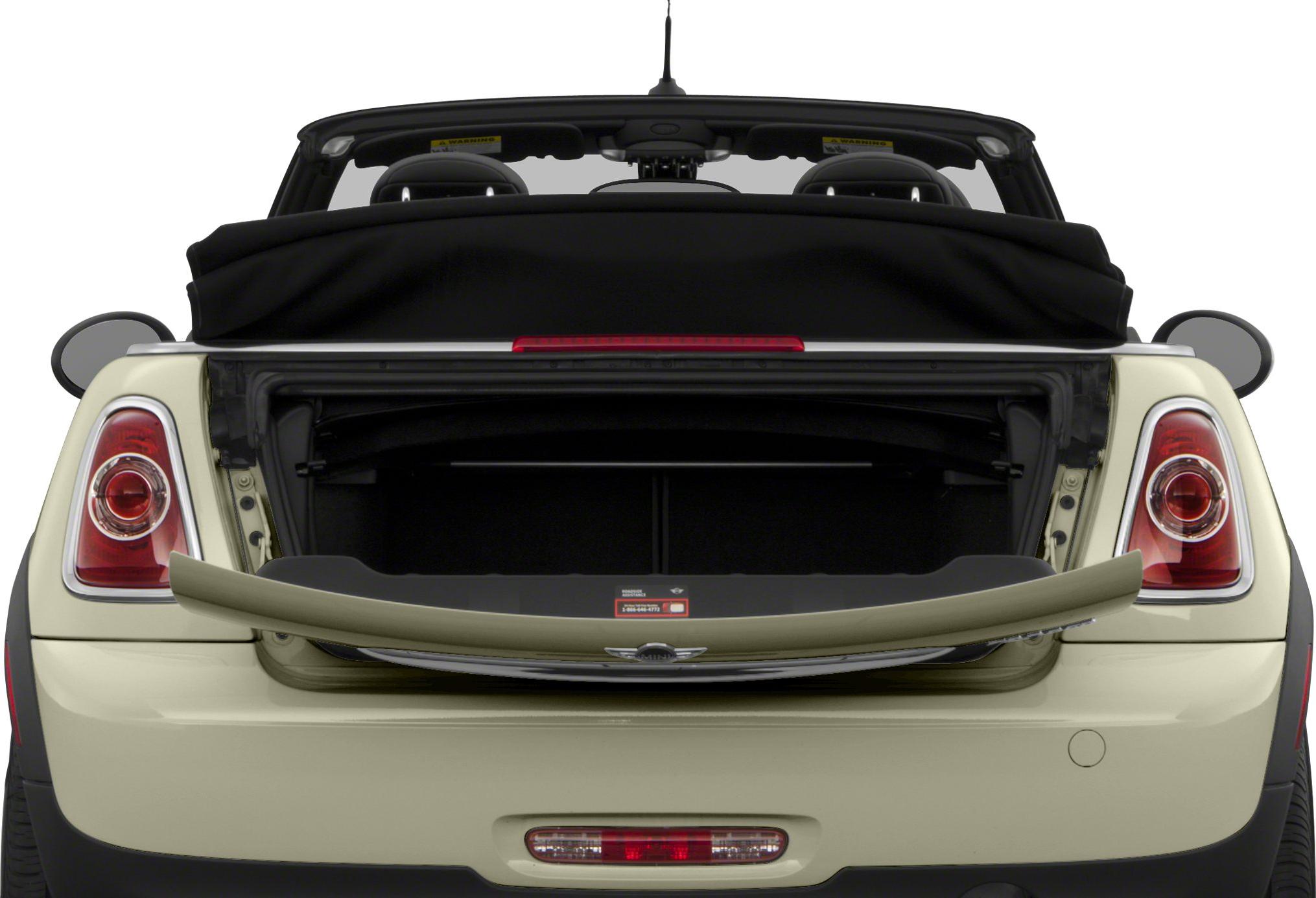 Rear view of open trunk and folded soft top
