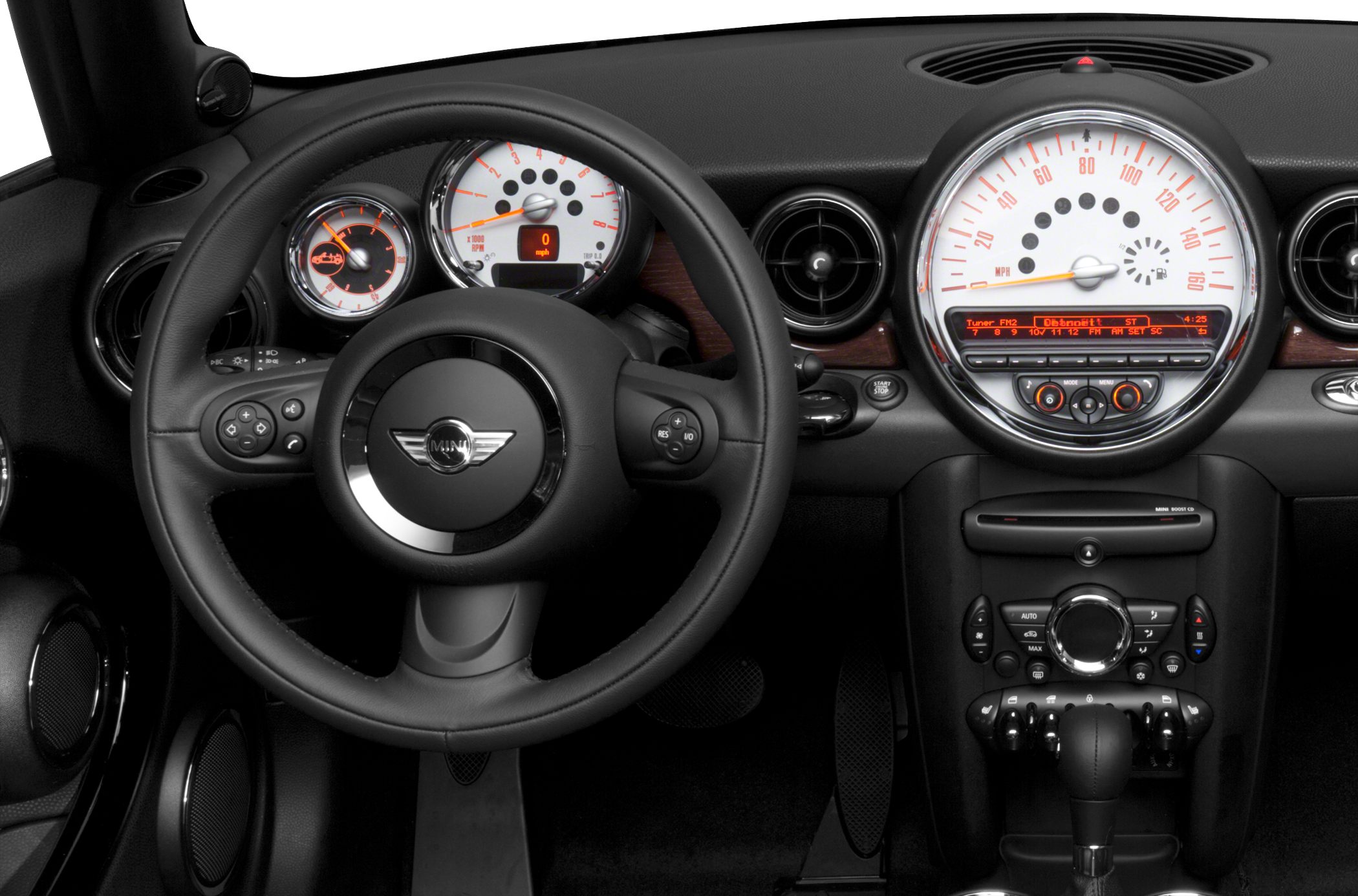 Steering wheel and dashboard with speedometer and control buttons