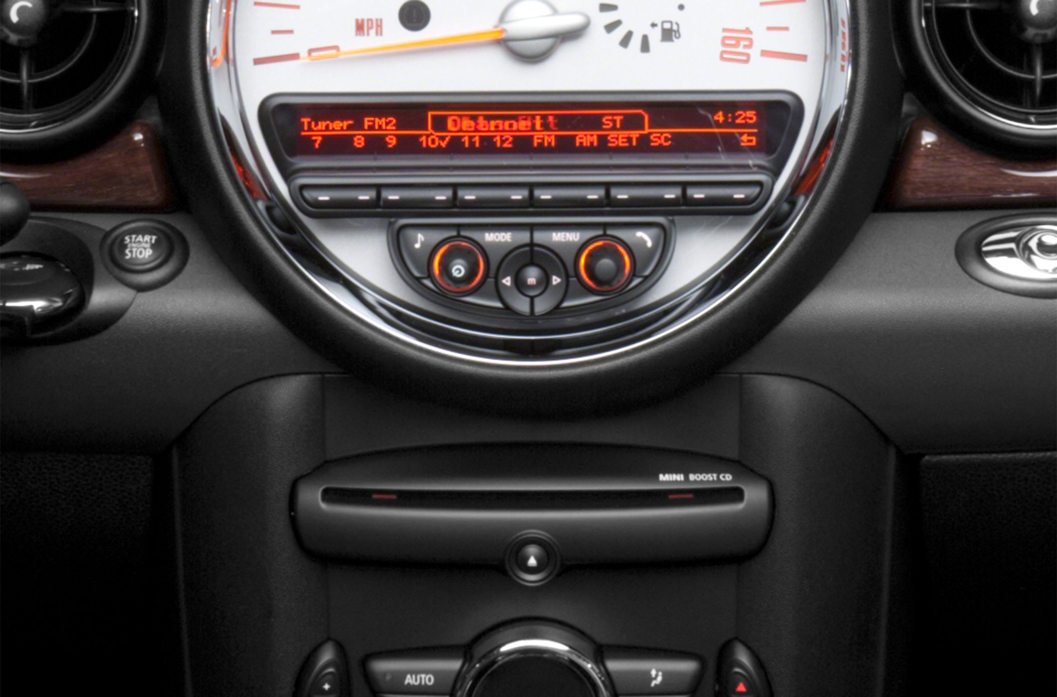 Dashboard with speedometer and music control panel in modern car