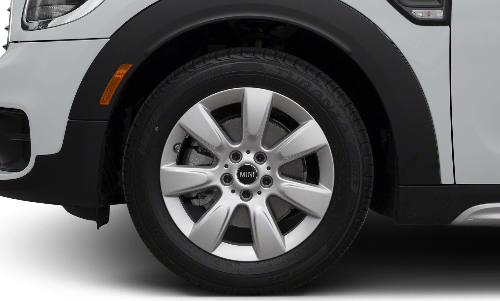 Close-up of alloy wheel and black fender trim