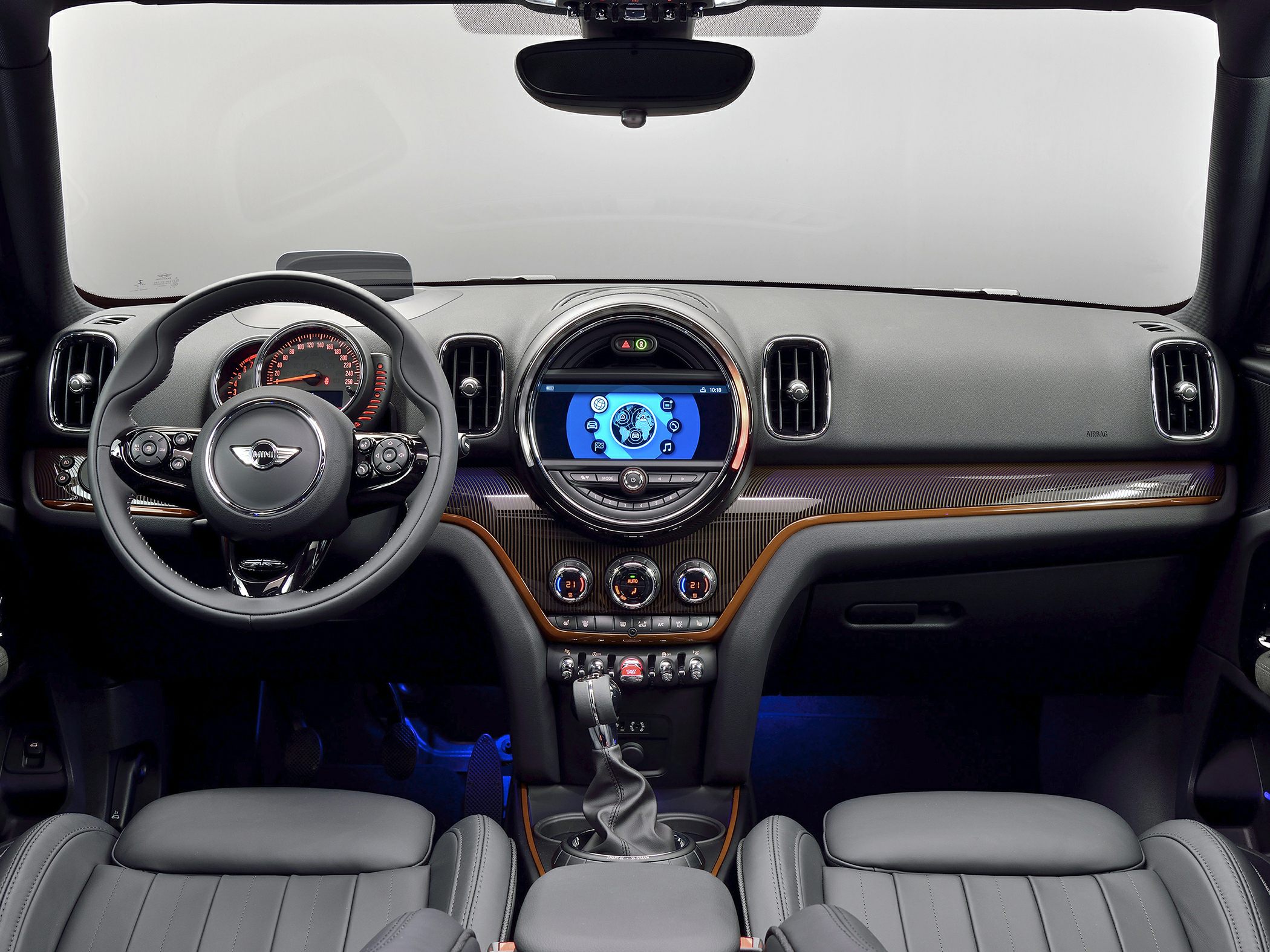 Car dashboard with digital instrument cluster and central infotainment display