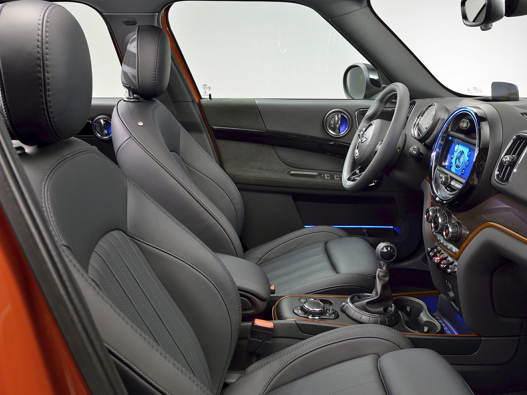 Modern car interior with leather seats and digital center console