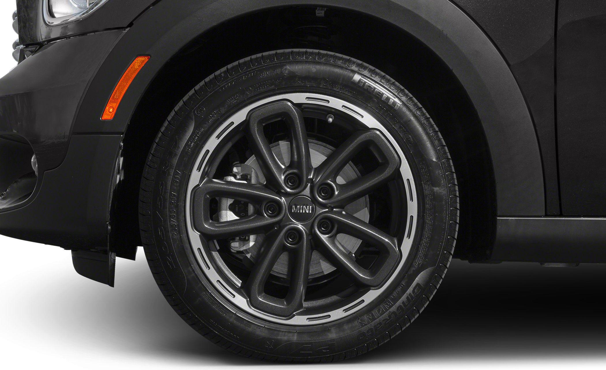 Close-up of modern stylish alloy wheel with distinctive 5-spoke design and tire tread.