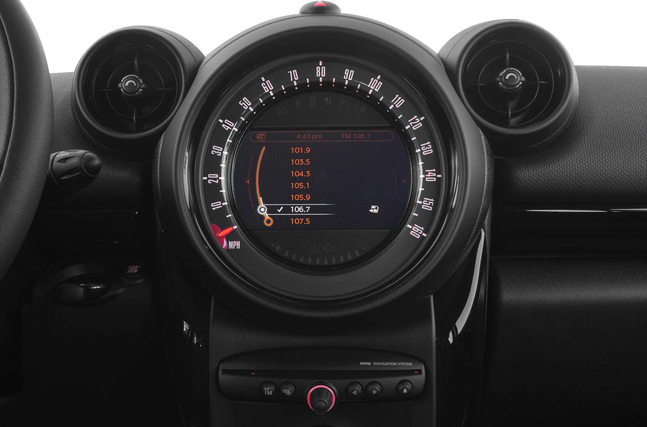 Central circular speedometer with digital navigation display and dual air vents