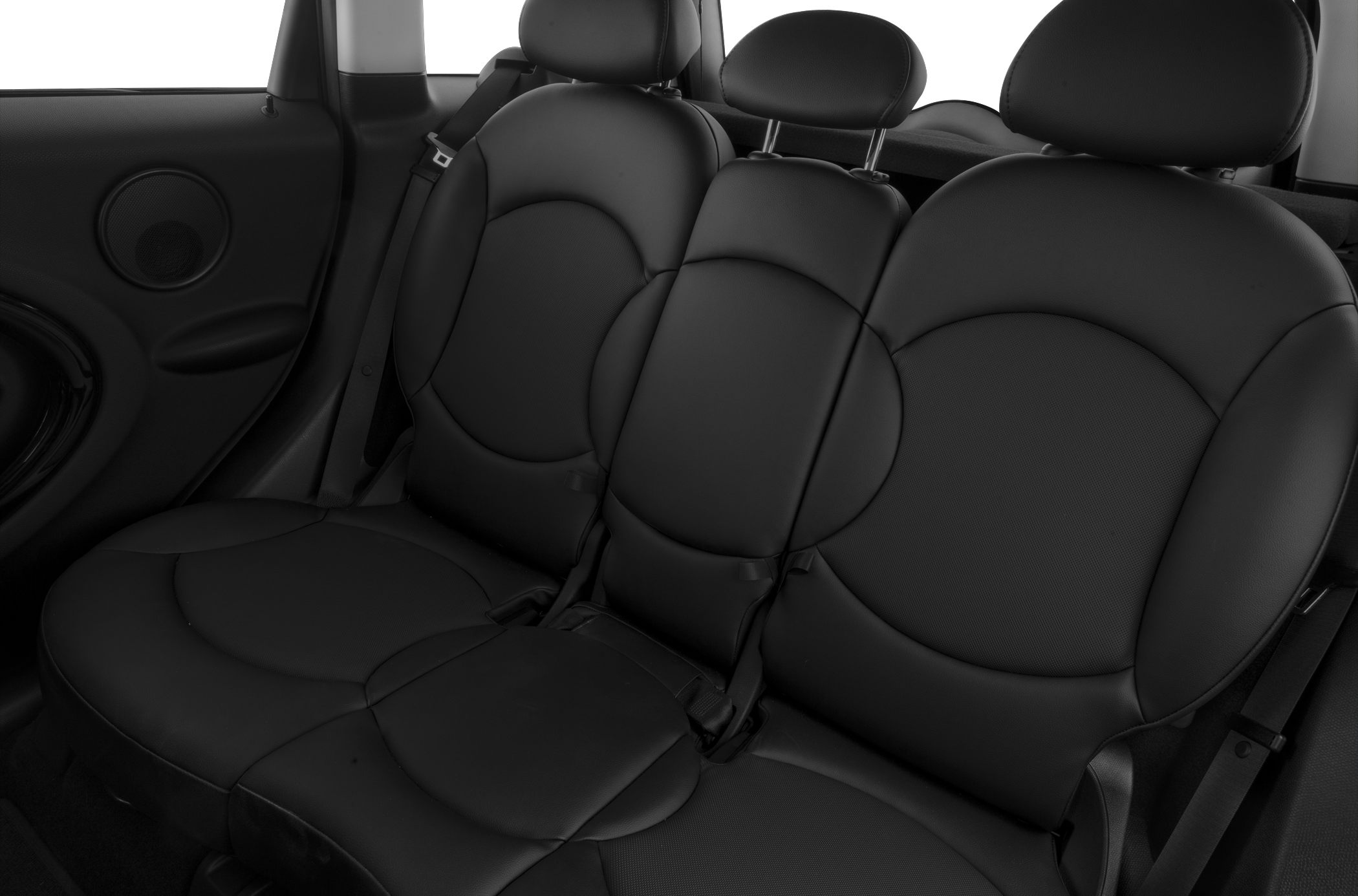 Black leather rear seats with headrests and seatbelt.