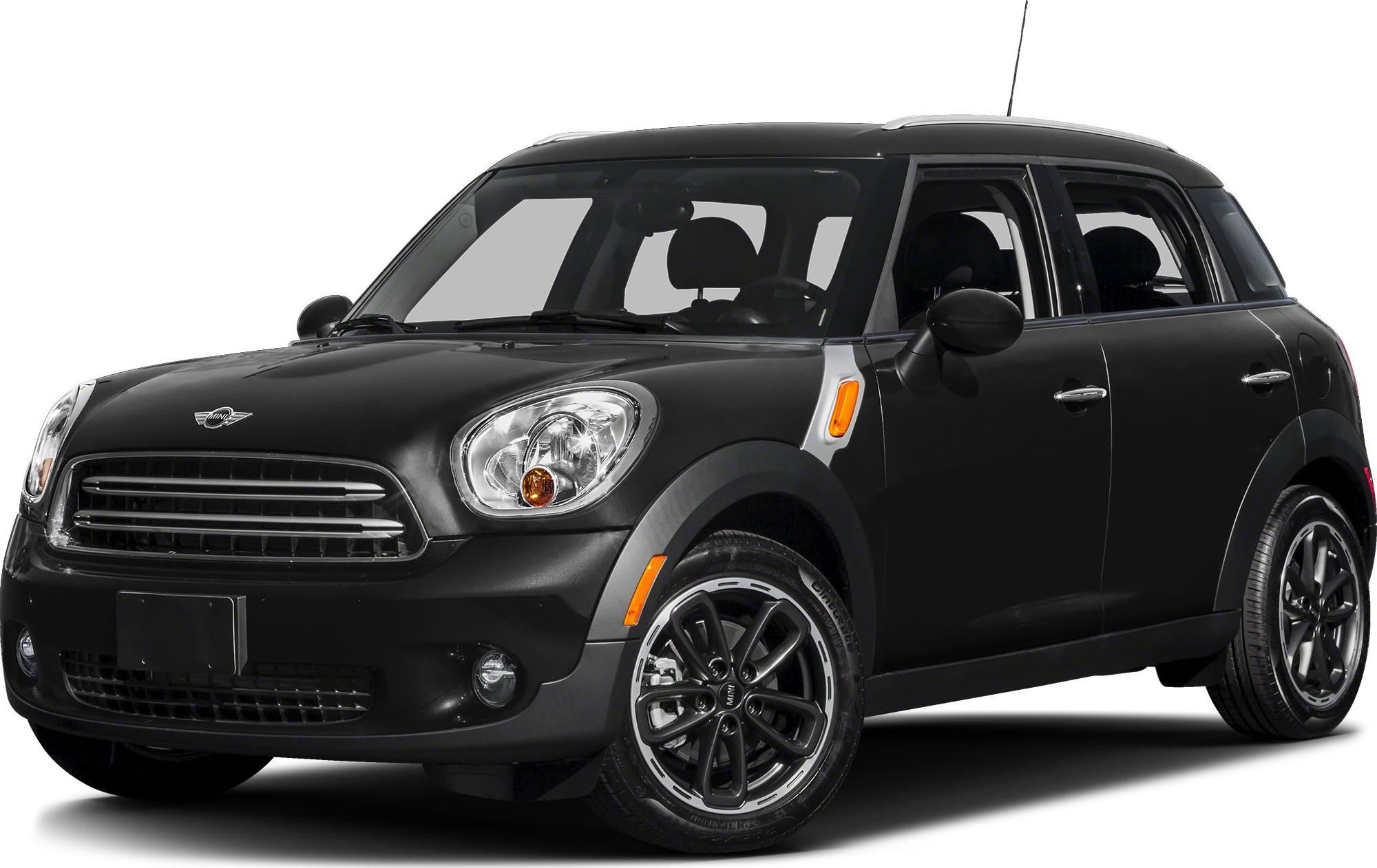 Front side view of black compact SUV with distinctive headlights and alloy wheels