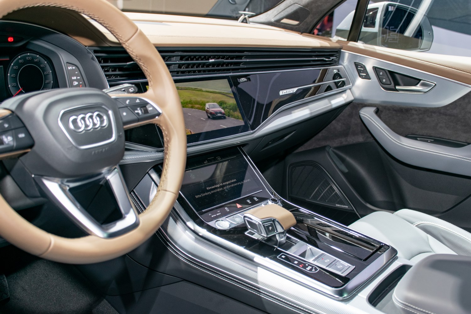 Digital dashboard and touchscreen center console with steering wheel controls