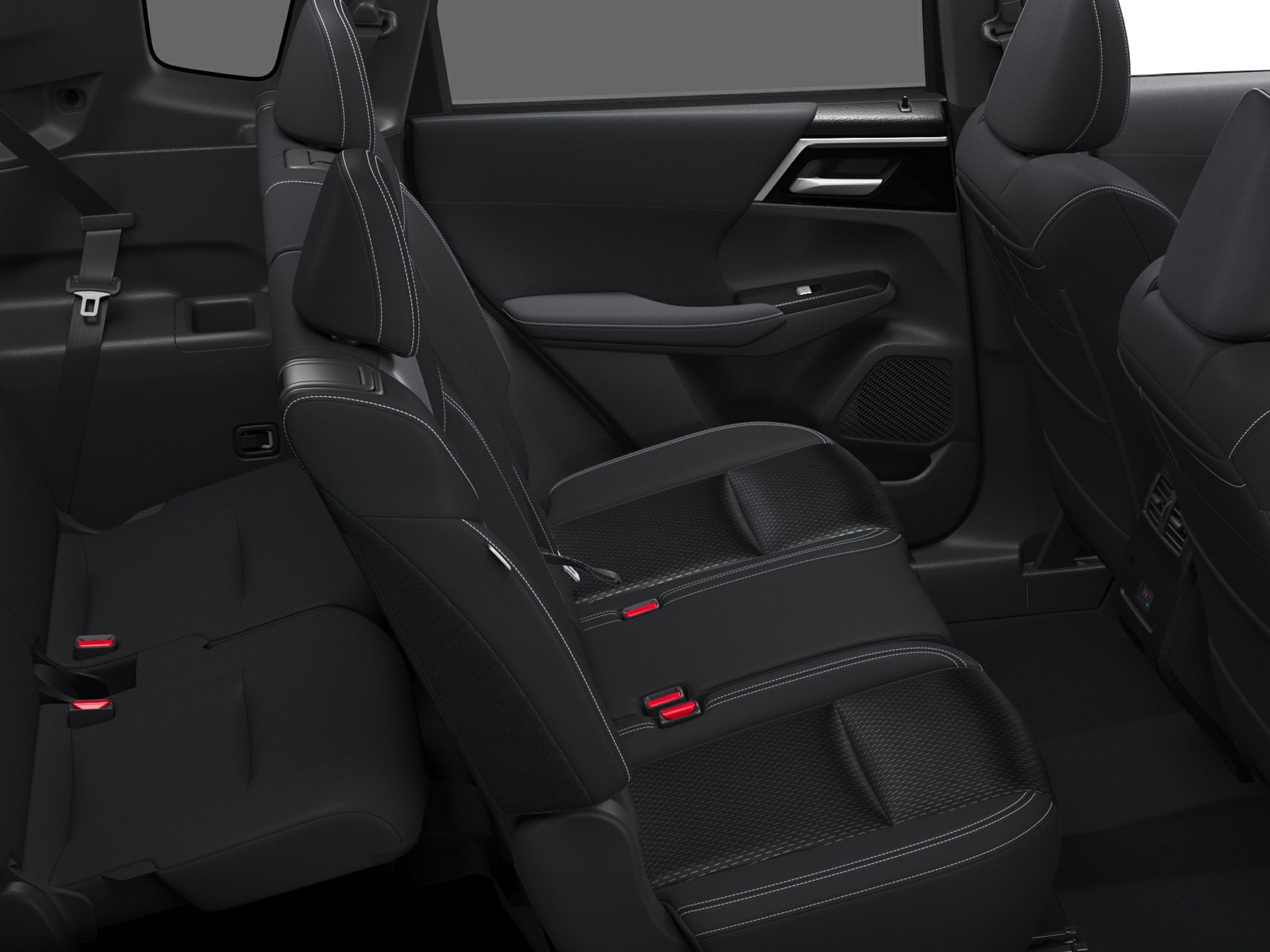 Spacious rear passenger seating with detailed stitching and modern upholstery.