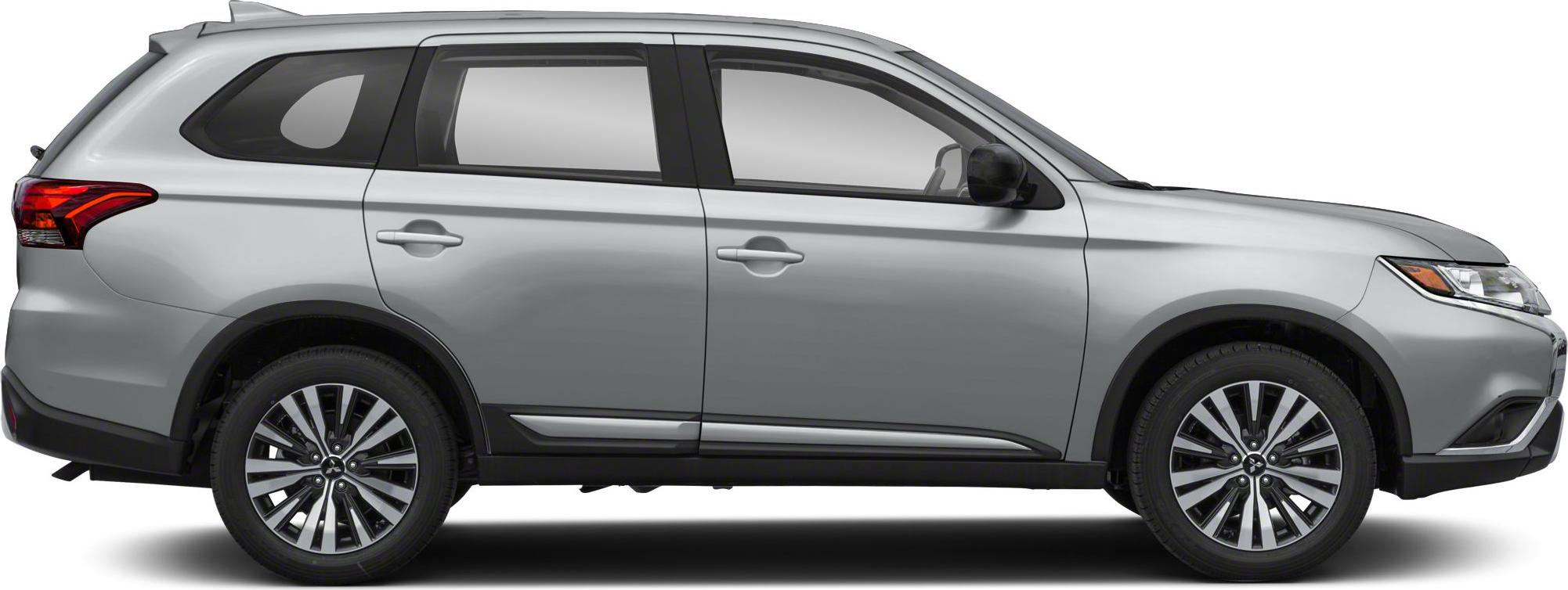Side profile of a silver SUV with alloy wheels.