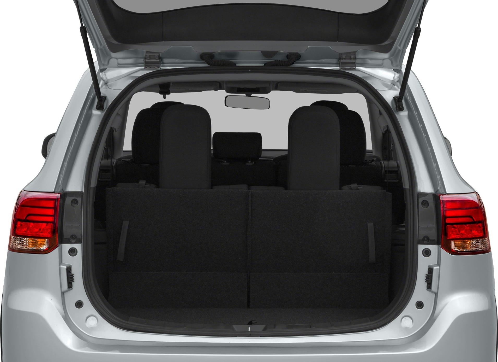 Spacious rear cargo area with upright rear seats and open tailgate