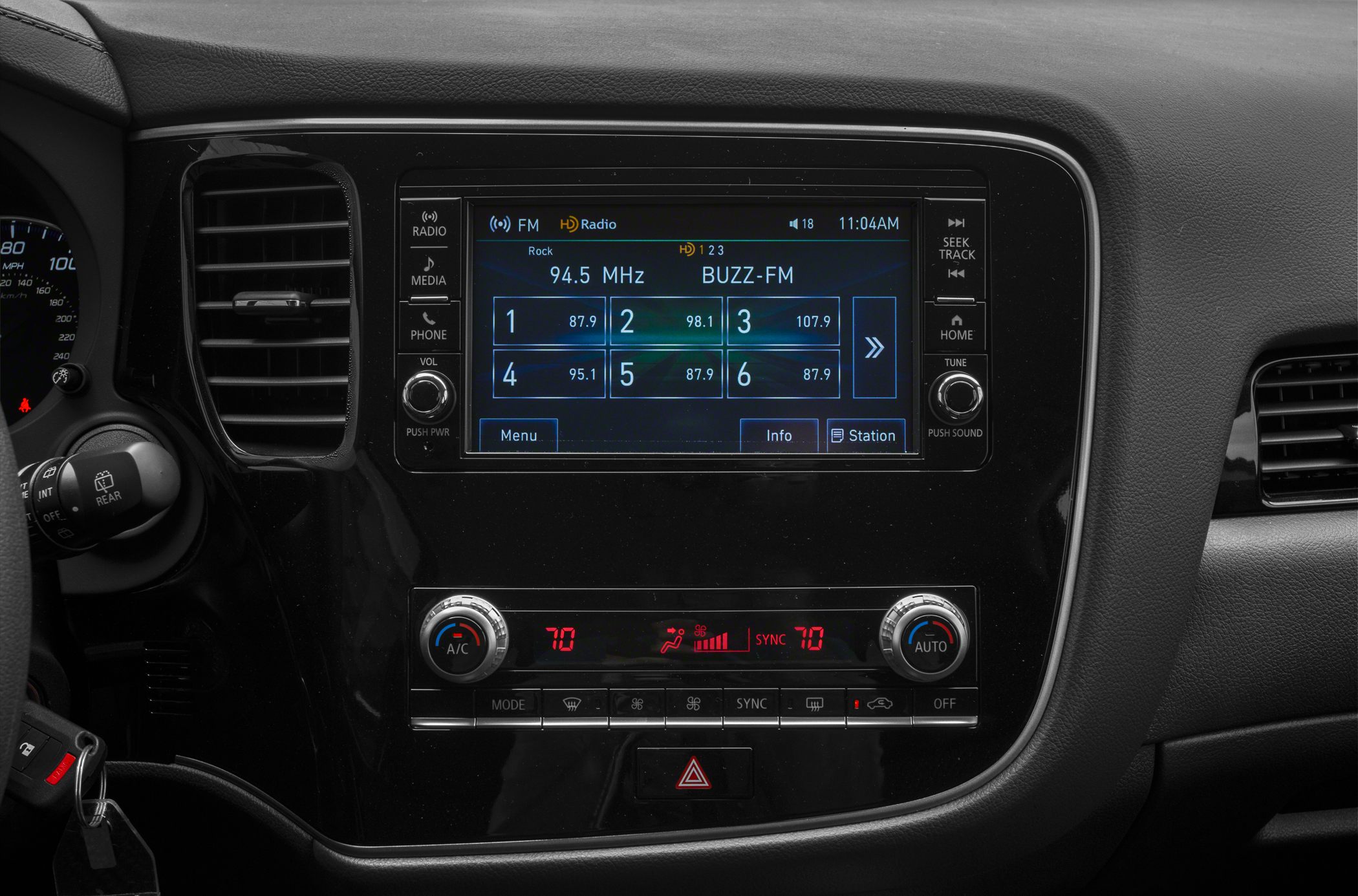 Infotainment touchscreen and dual-zone climate control panel