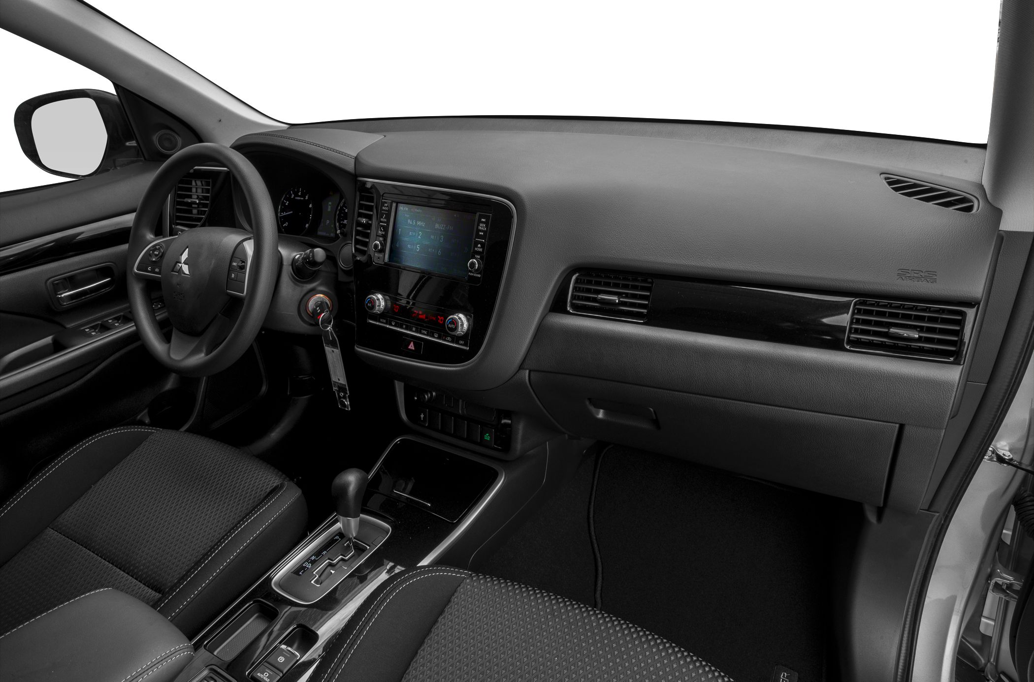 Dashboard, steering wheel, and center console interior view