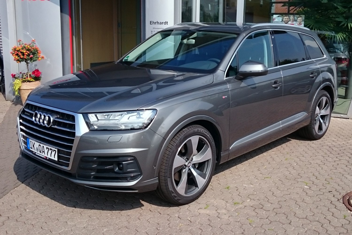 Front-side view of LED headlights and five-spoke alloy wheels