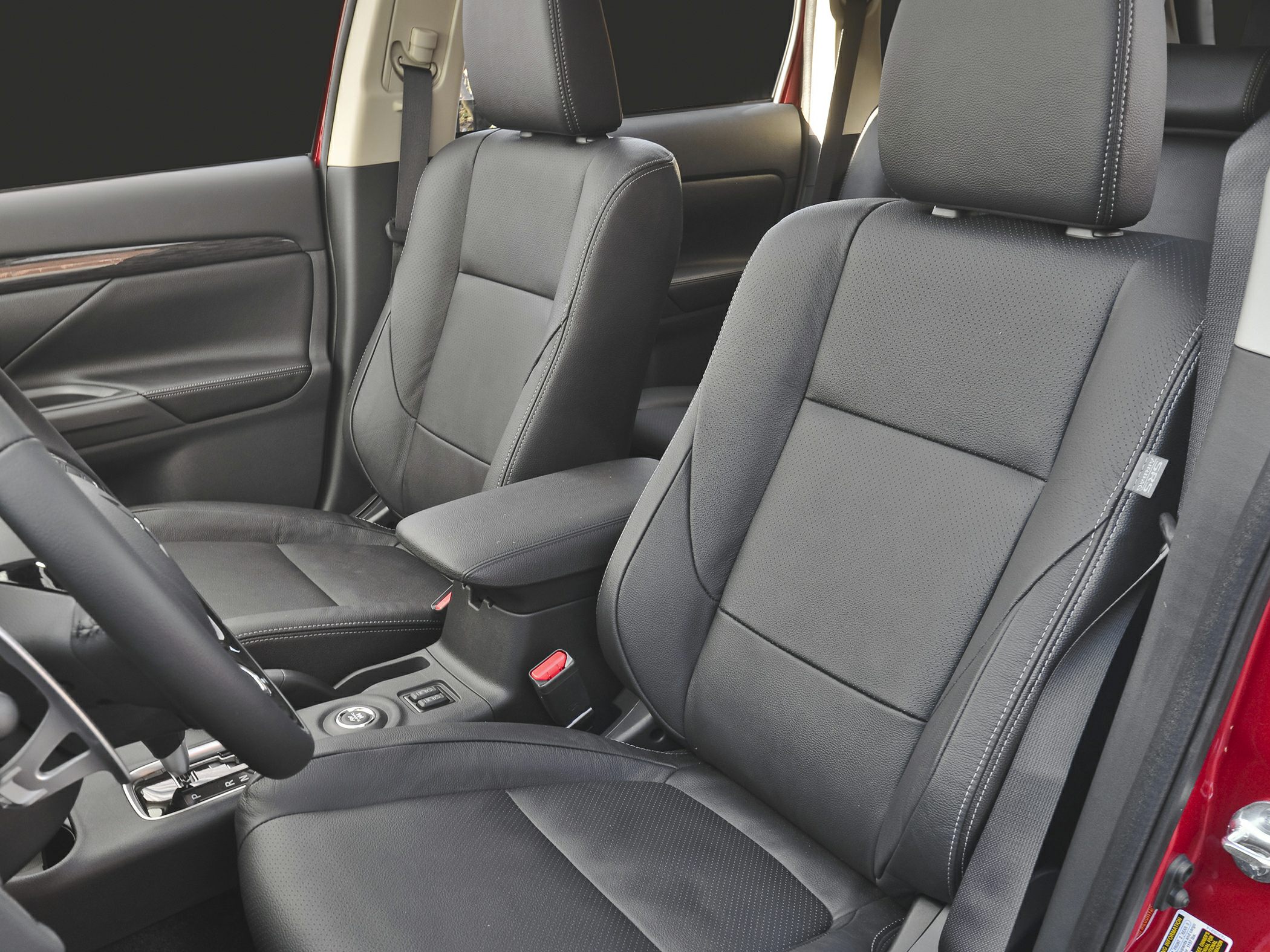 Front leather seats and interior door panel with stitching