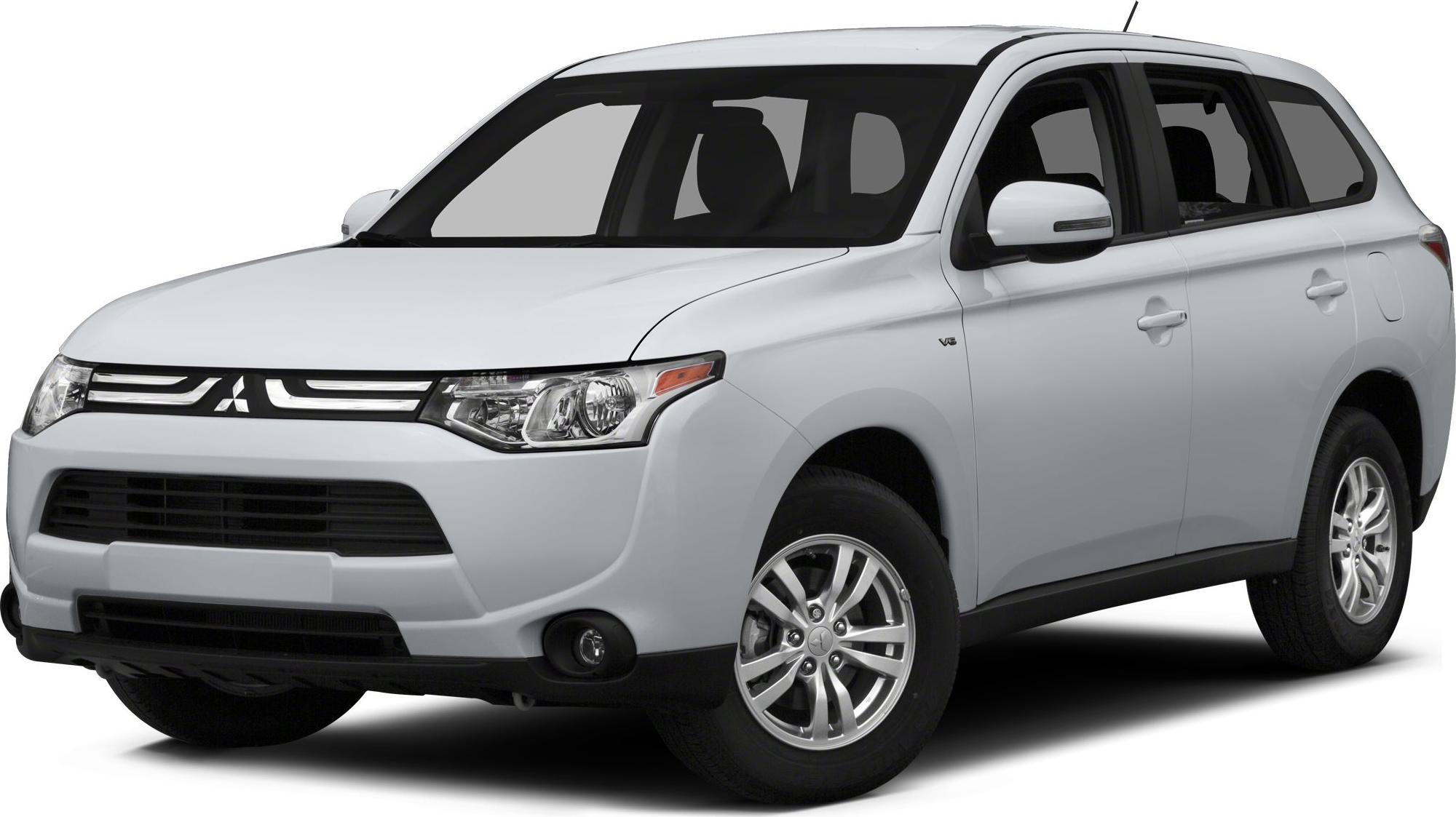 Front side profile of white SUV with V6 badge and alloy wheels
