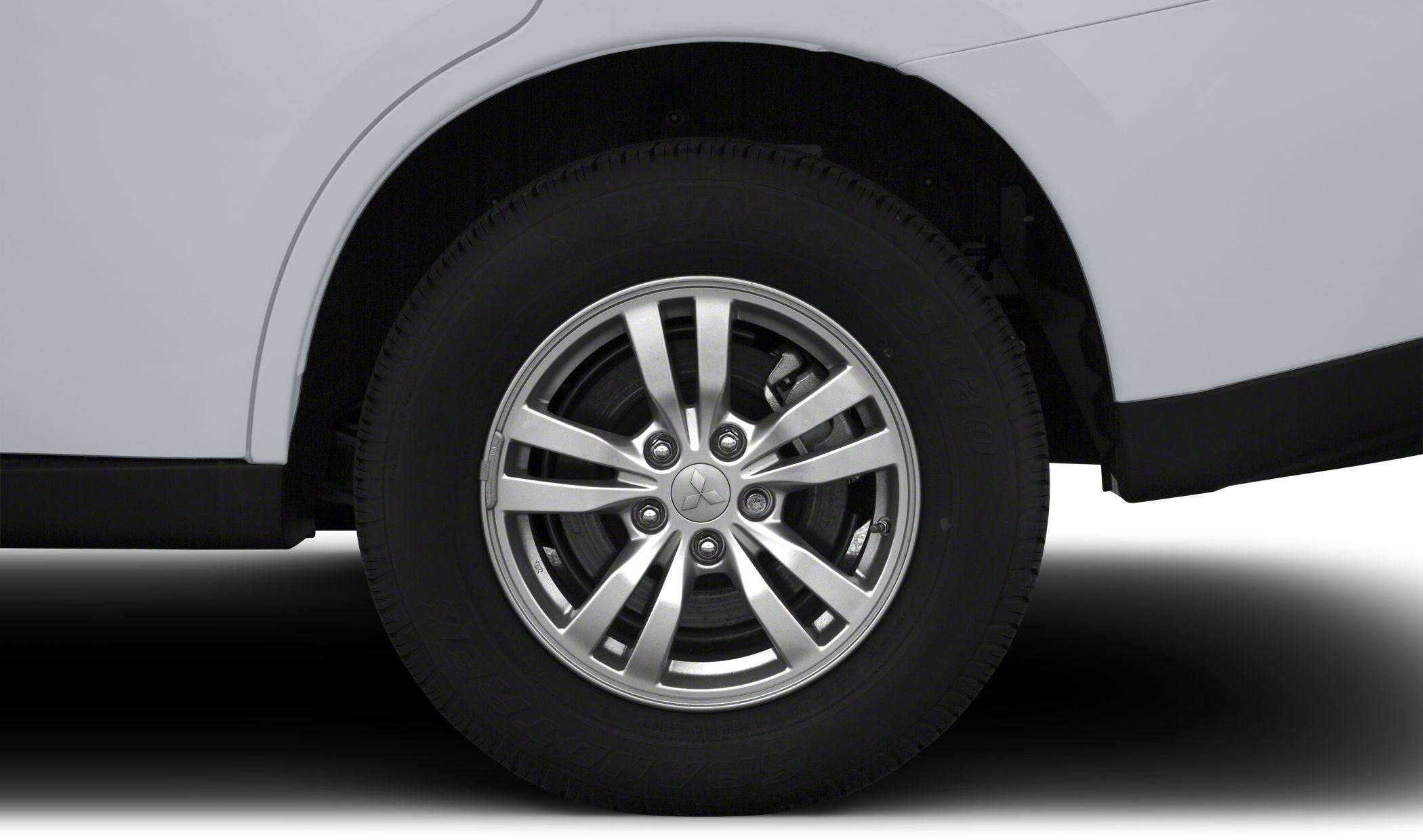 Alloy wheel and tire close-up with multi-spoke rim design