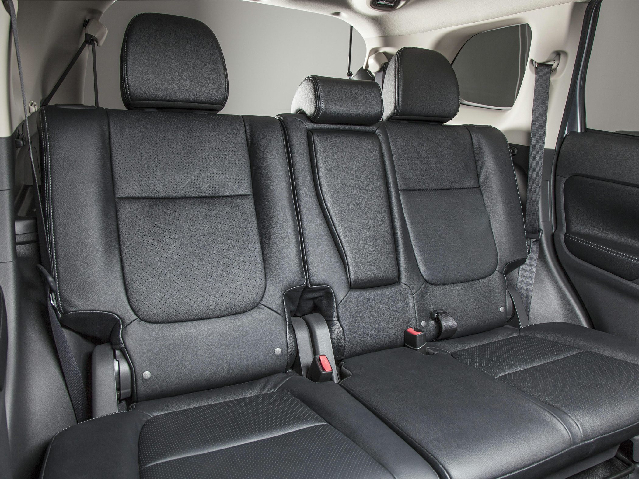 Black leather rear seats with headrests and seat belts