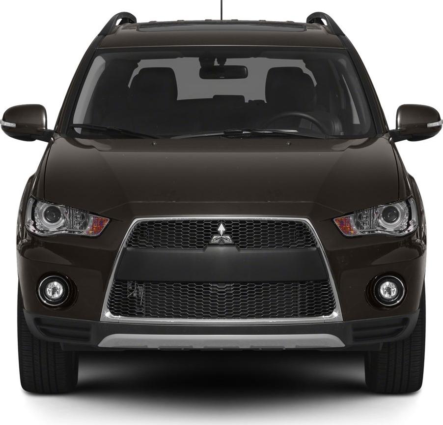 Front grille, headlights, and fog lights of an SUV.